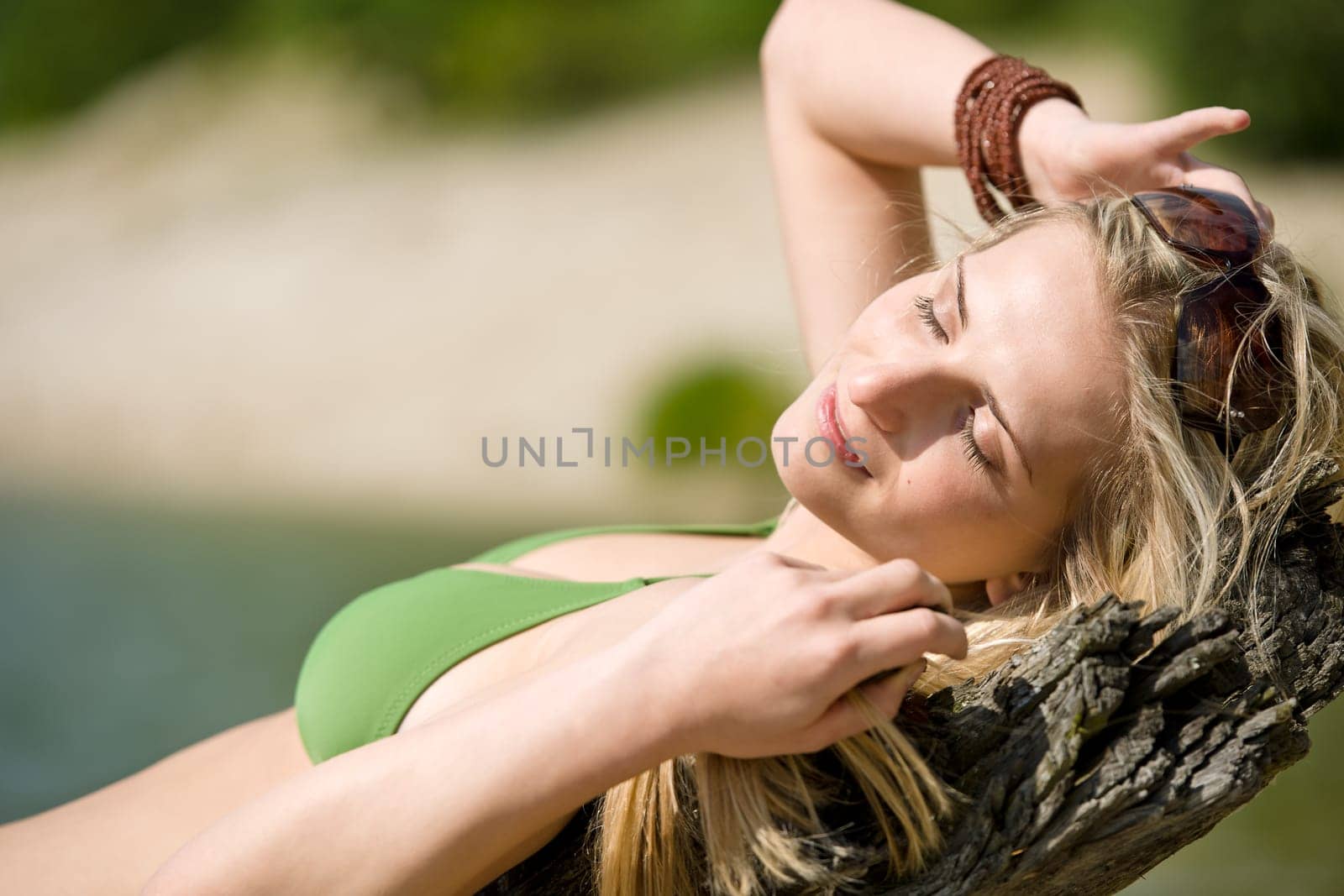 Blond woman enjoy summer sun