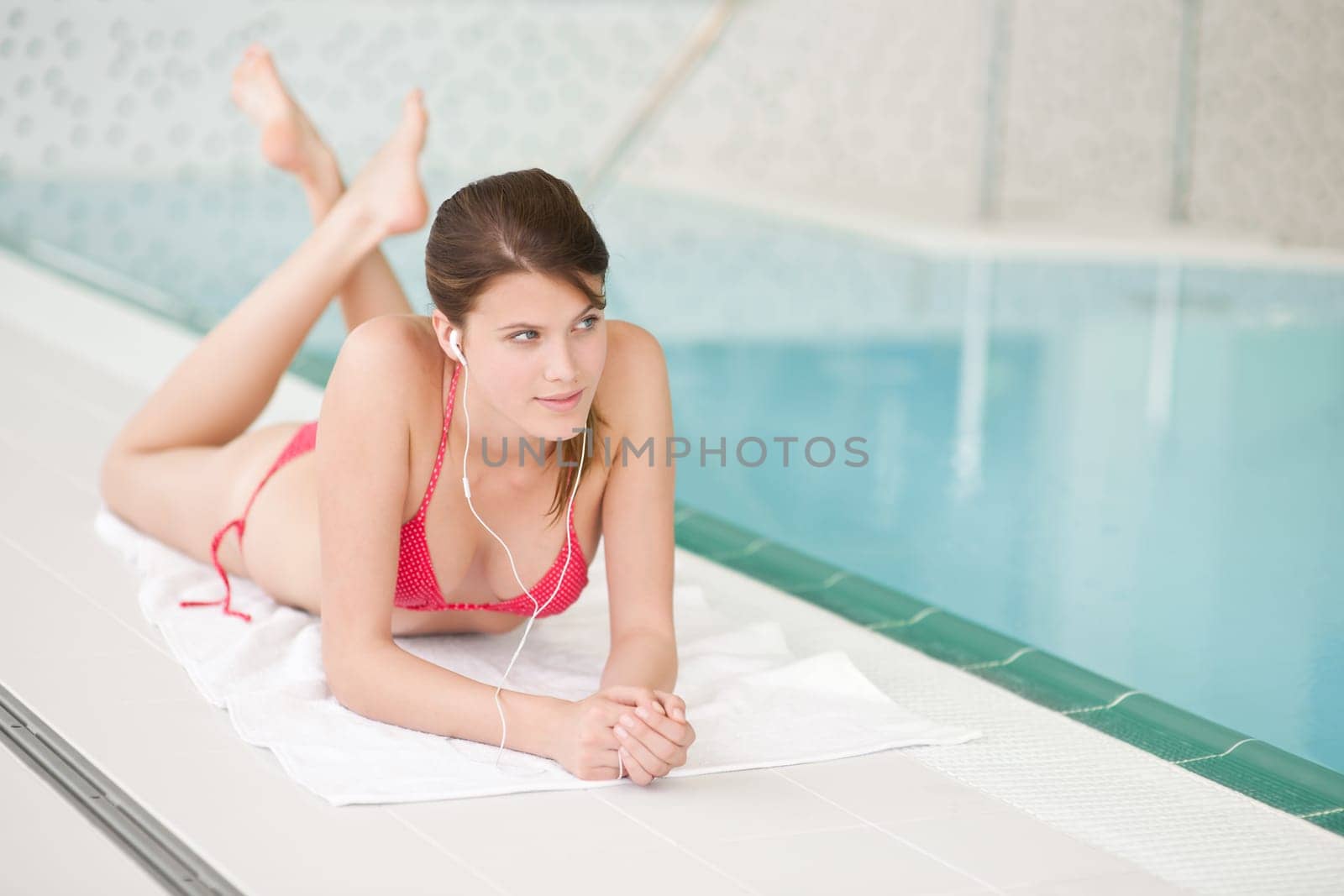 Swimming pool - beautiful woman in bikini