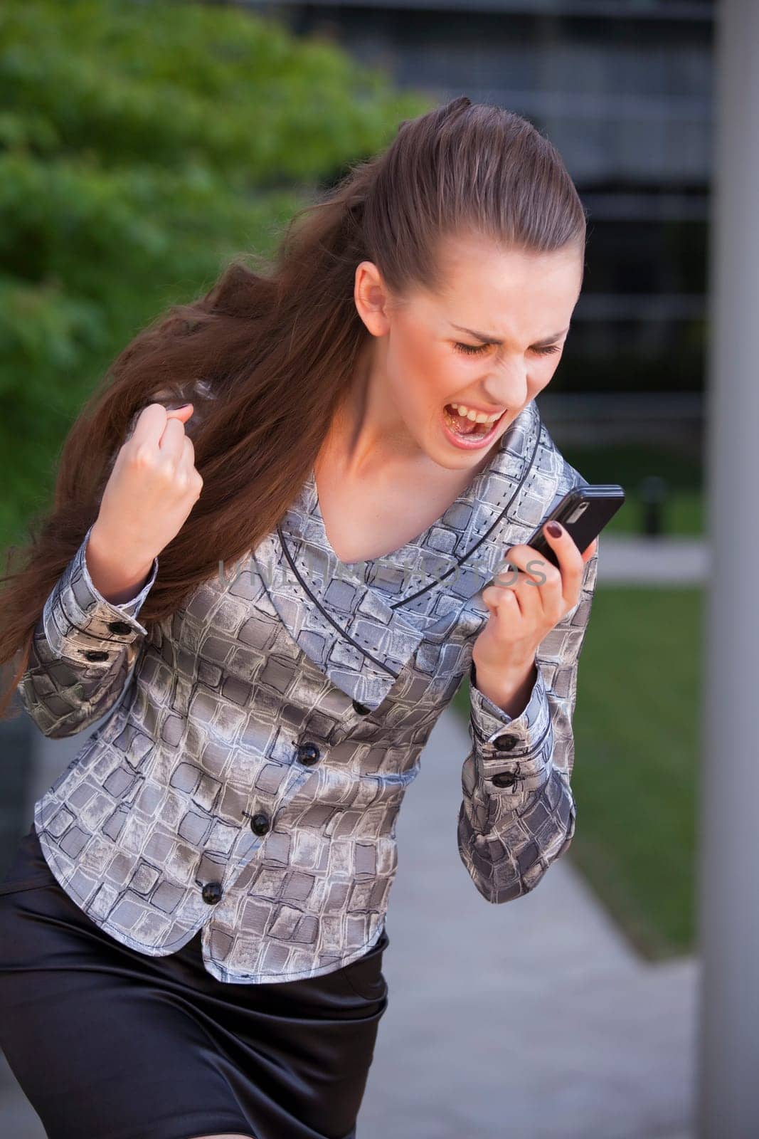 woman screaming on cell phone