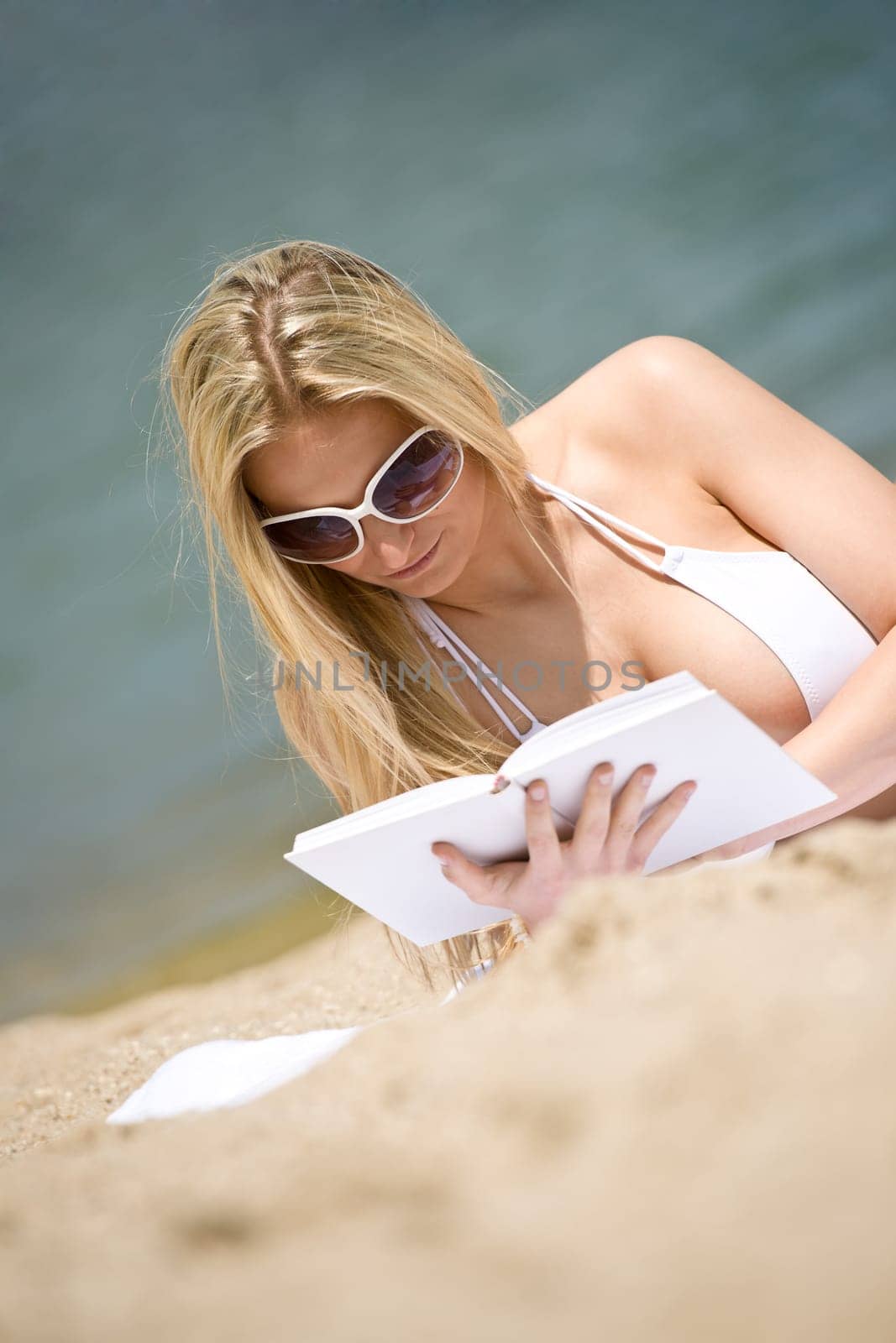 Blond woman relax on beach
