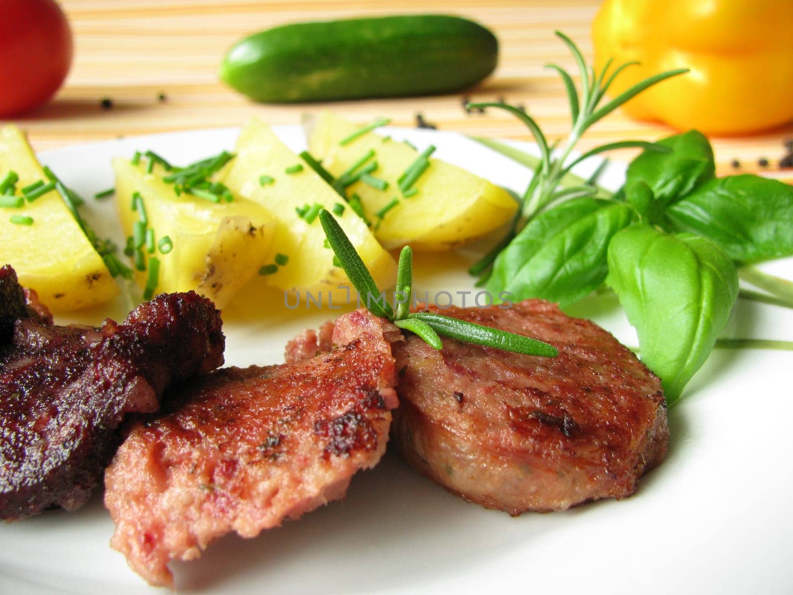 Jacket potatoes baked sausage