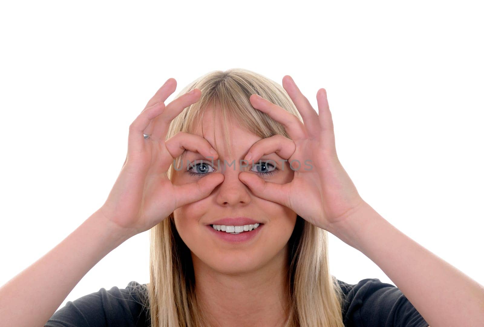 Young woman showing binoculars