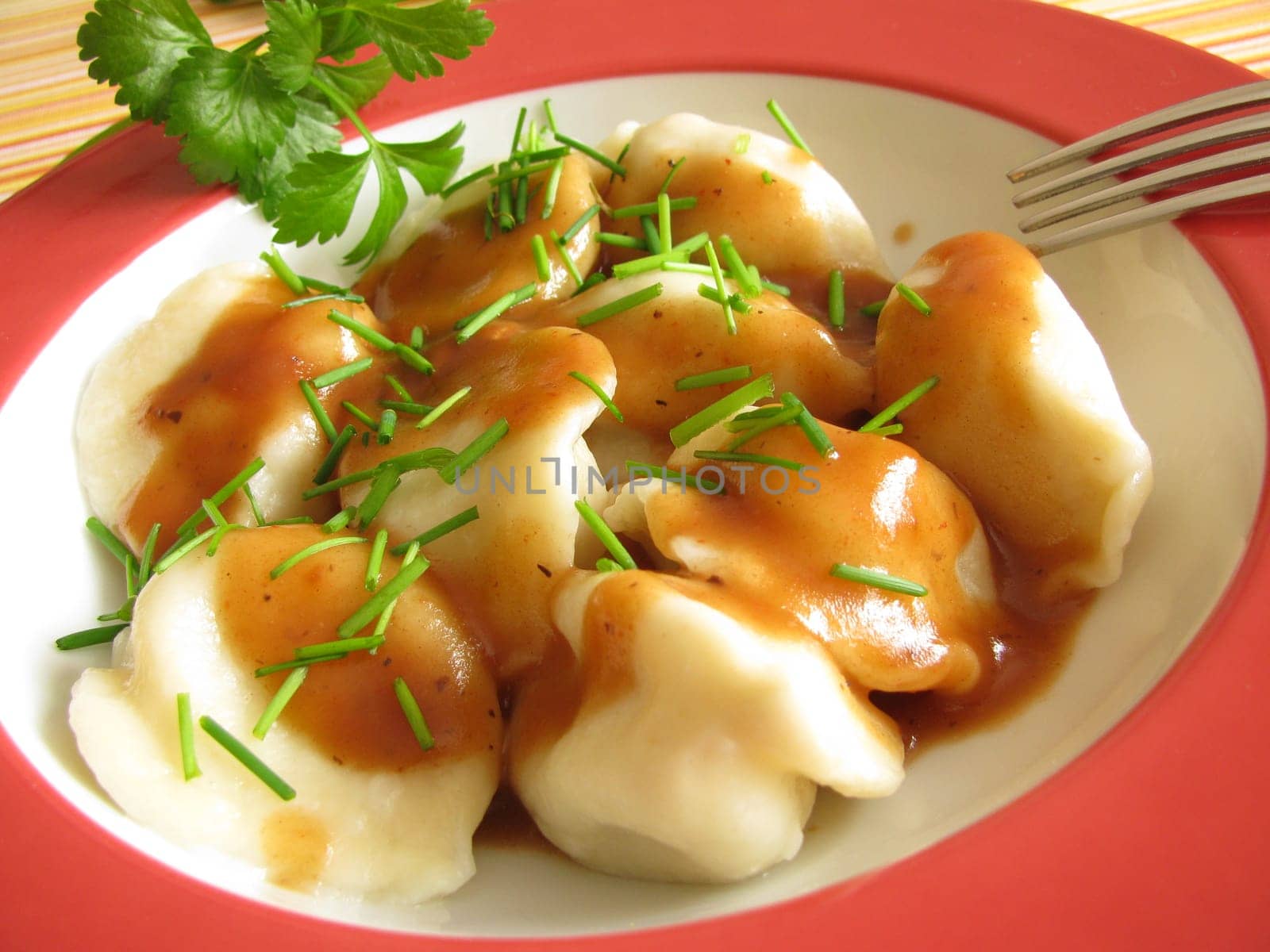 Pelmeni in mushroom cream sauce