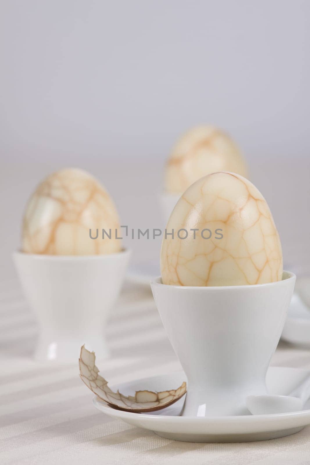 Three eggs in a cup