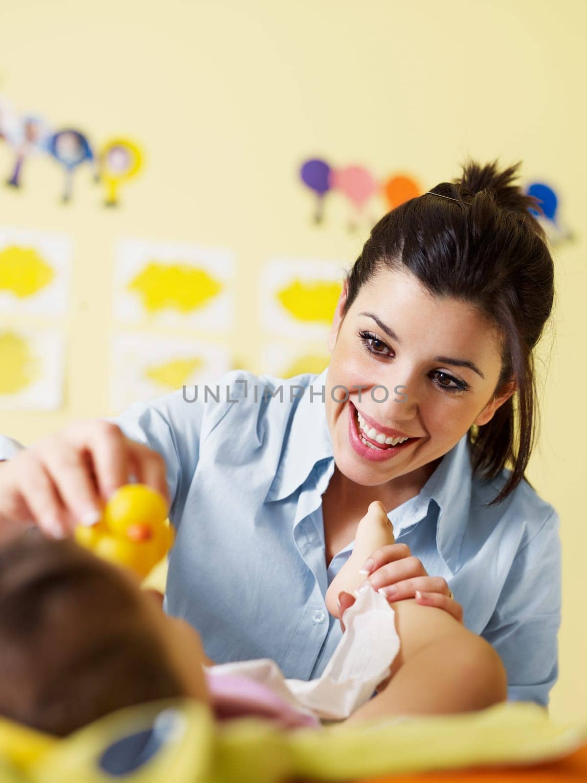 three little girls and female teacher in