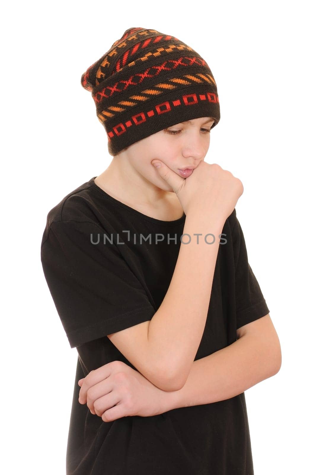 The teenager in a black vest and a hat