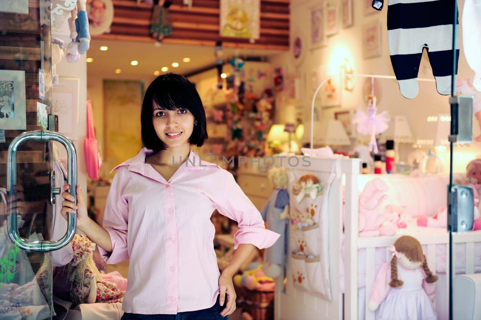 Businesswoman in front of her shop