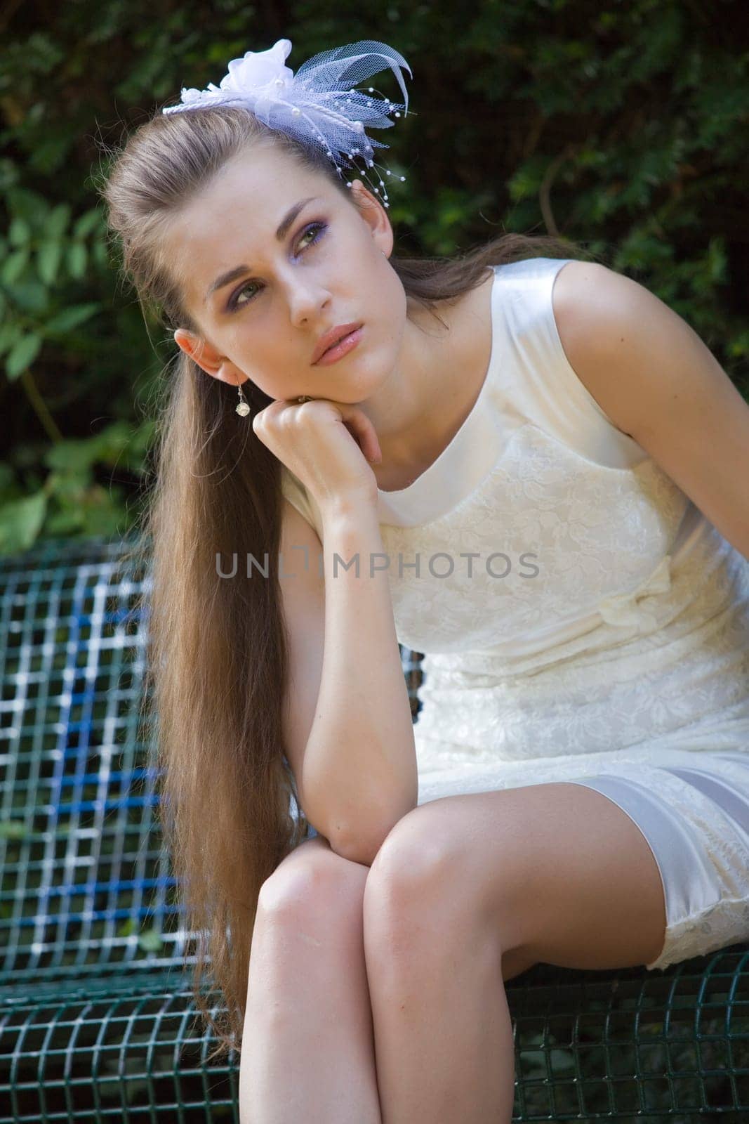 frustrated bride waiting in park