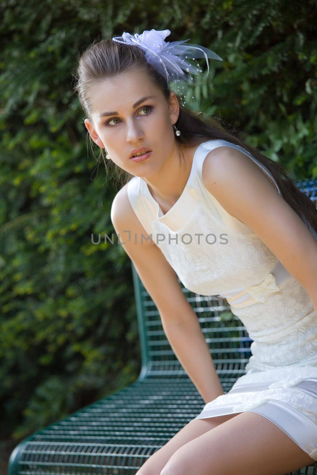 worried bride sitting on bench