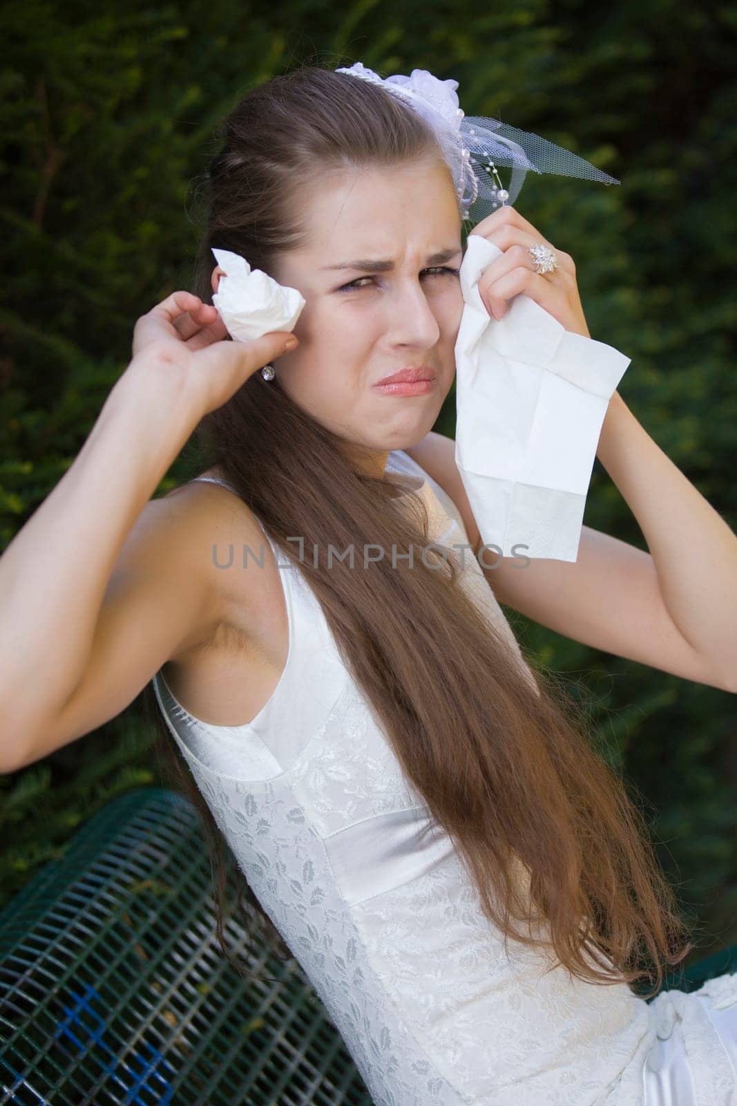 unhappy bride on bench