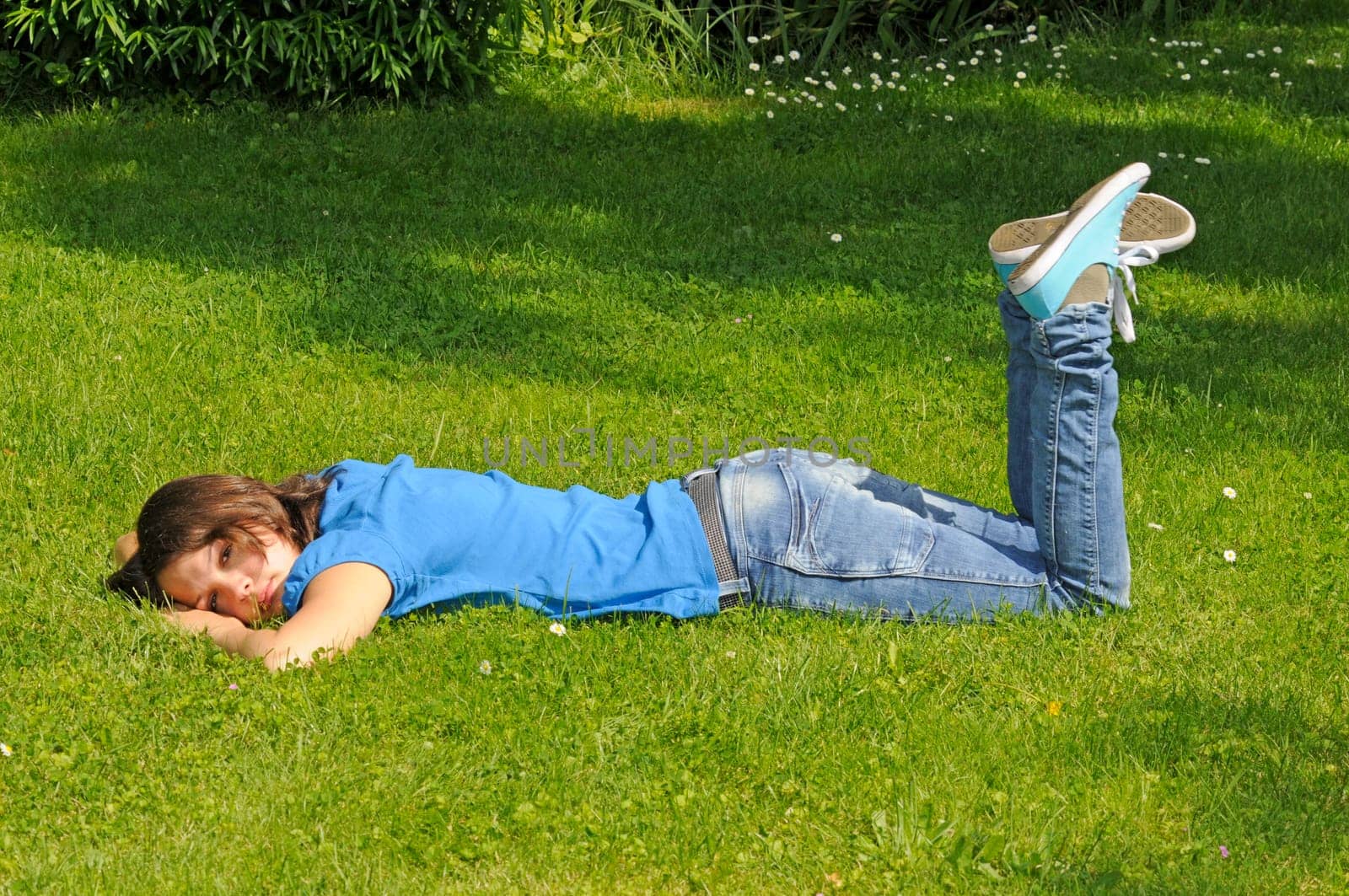 Teenage girl on a meadow