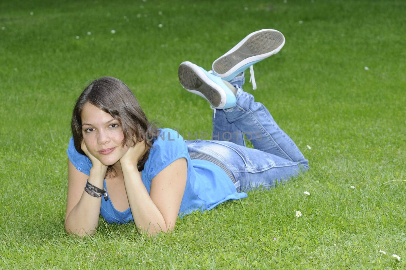Teenage girl on a meadow