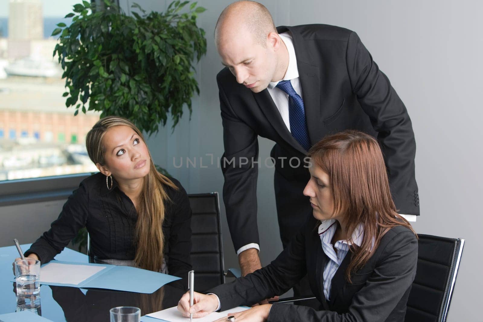 Two businesswomen and boss