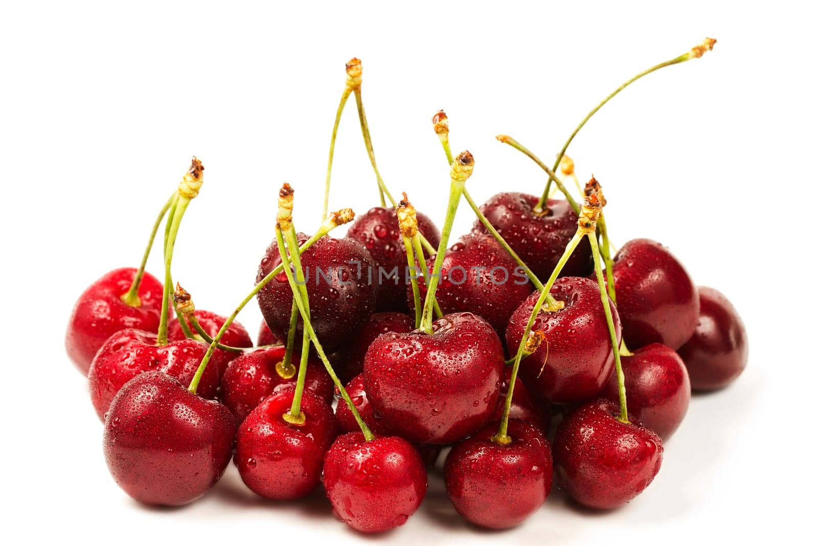 A mountain of wet cherries