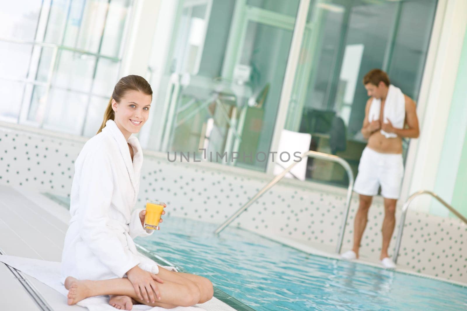 Luxury spa young woman relax with juice