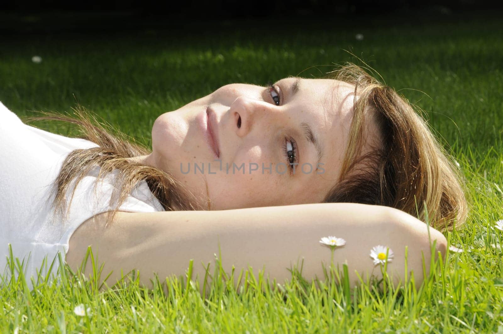 Young woman in the grass