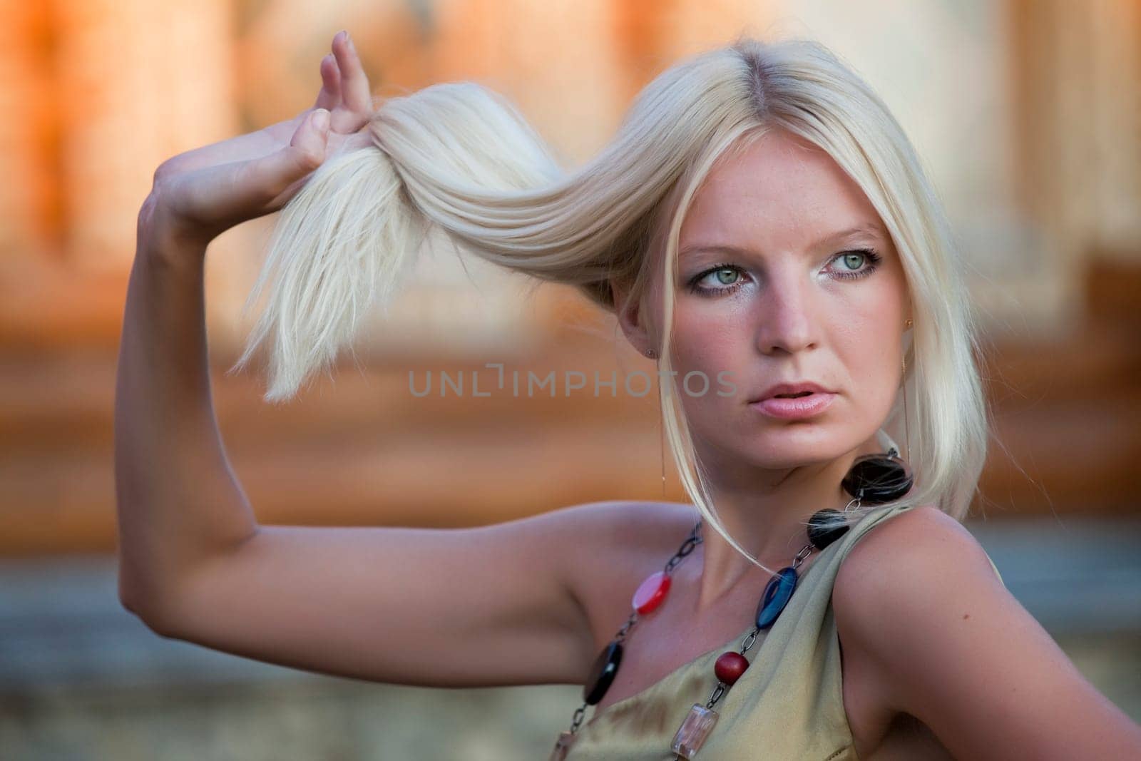 beautiful woman holding her hair