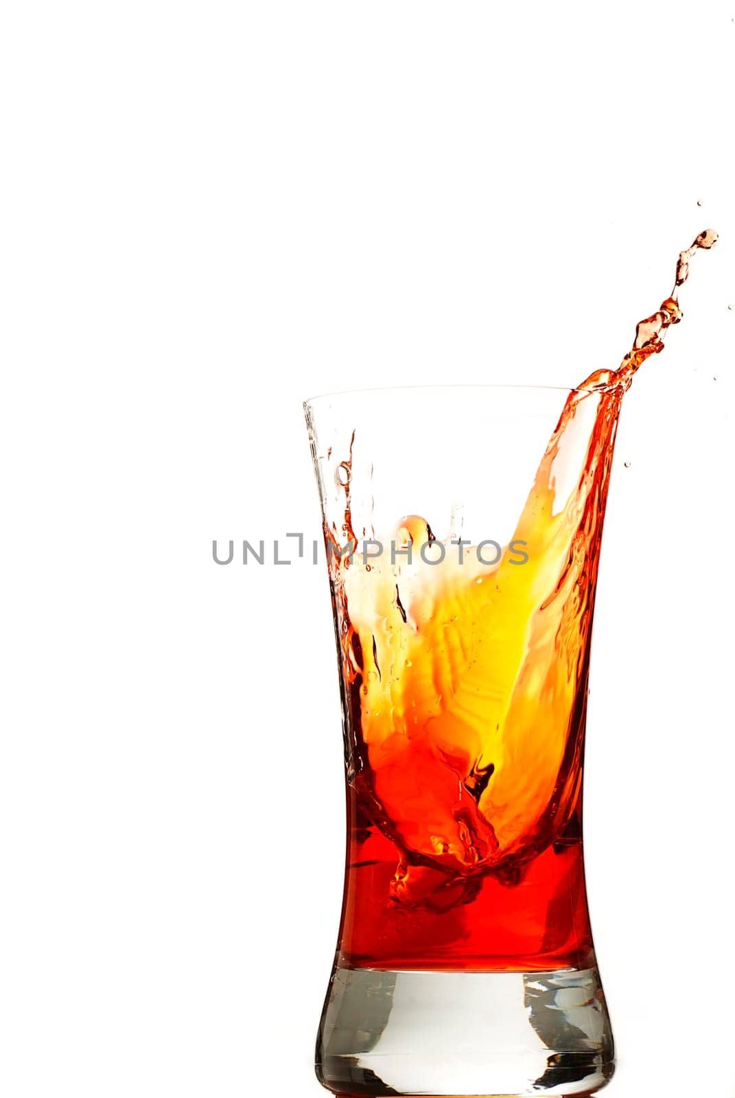 Ice cube falls in red
