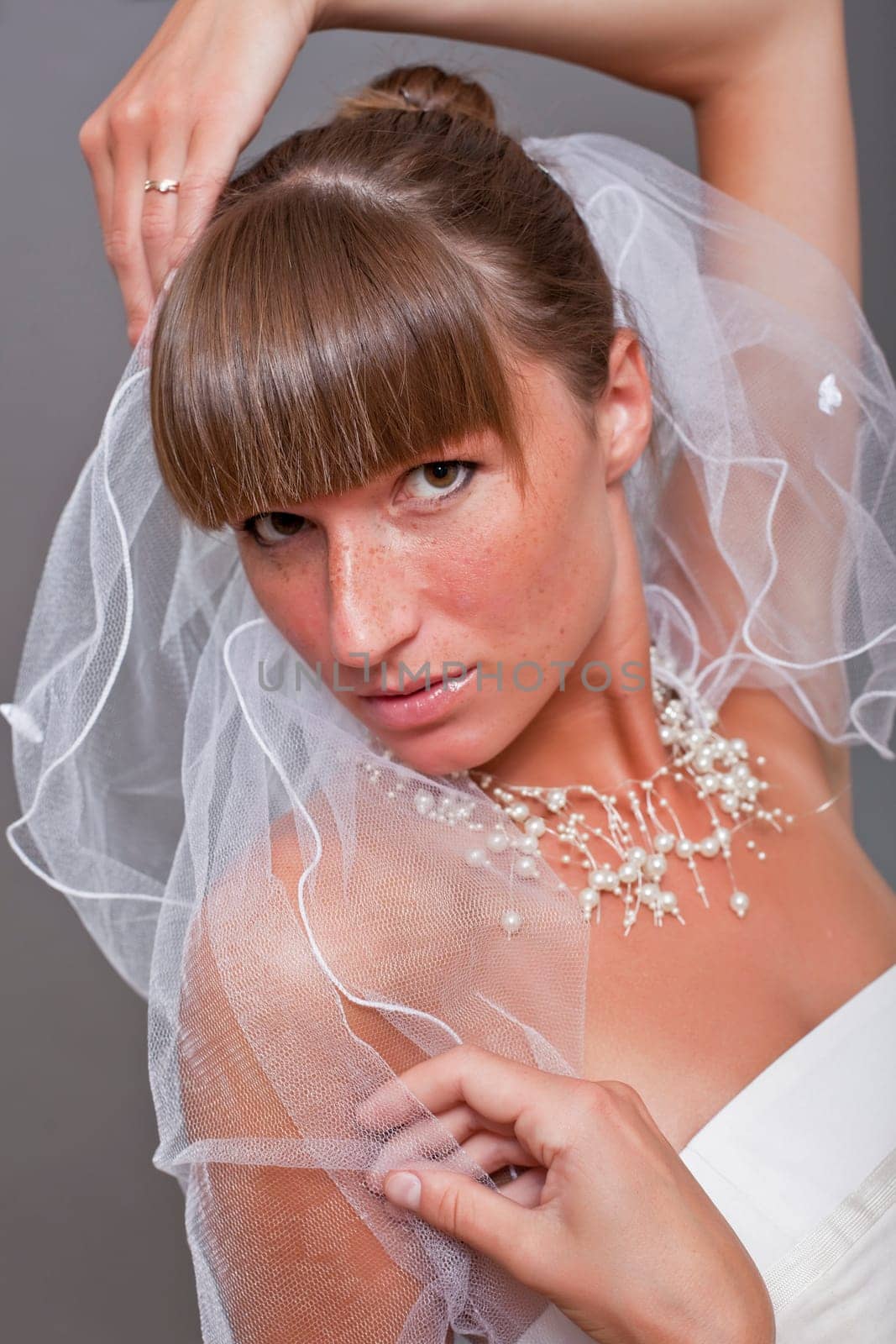 portrait of beautiful bride with veil