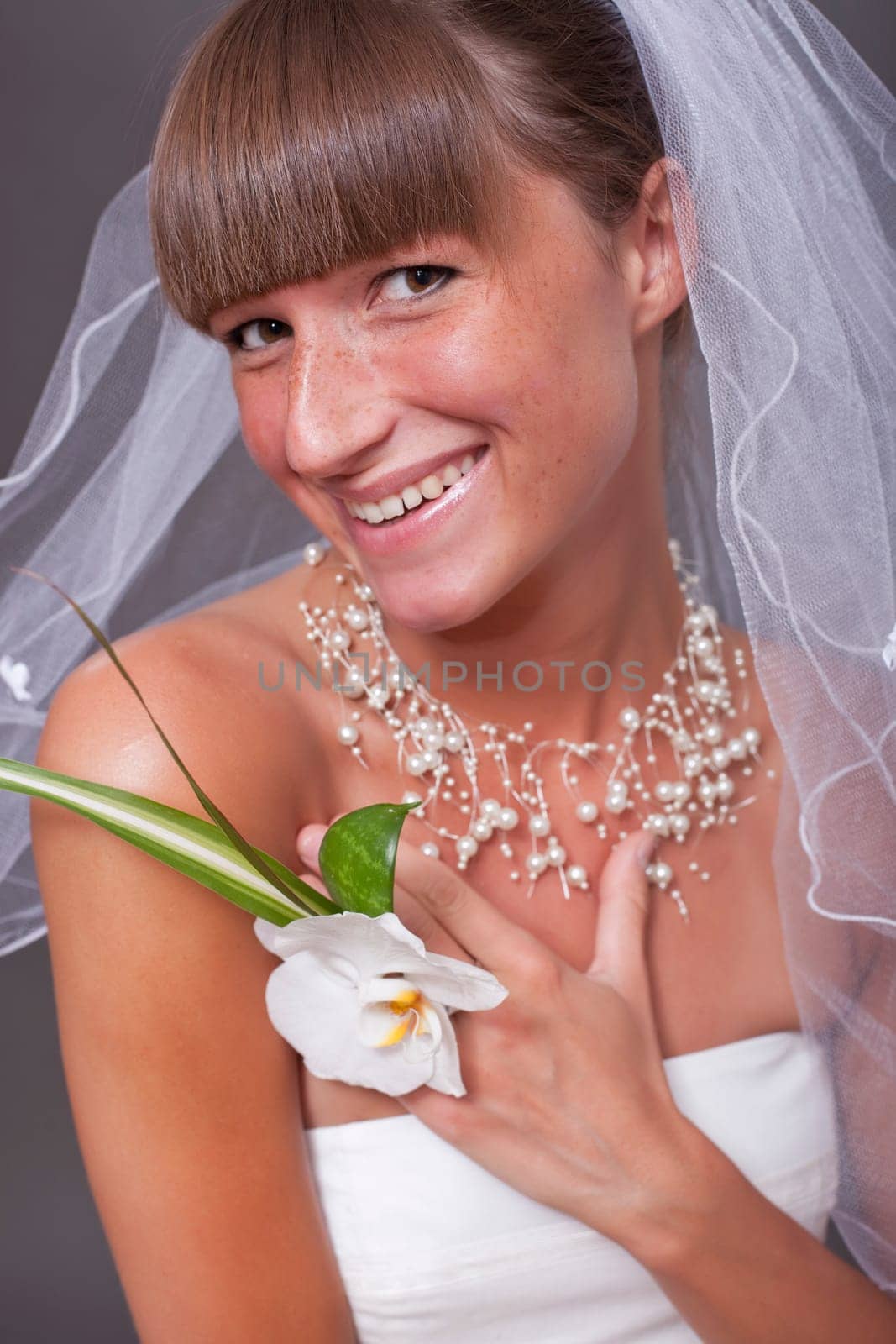 laughing bride with flower