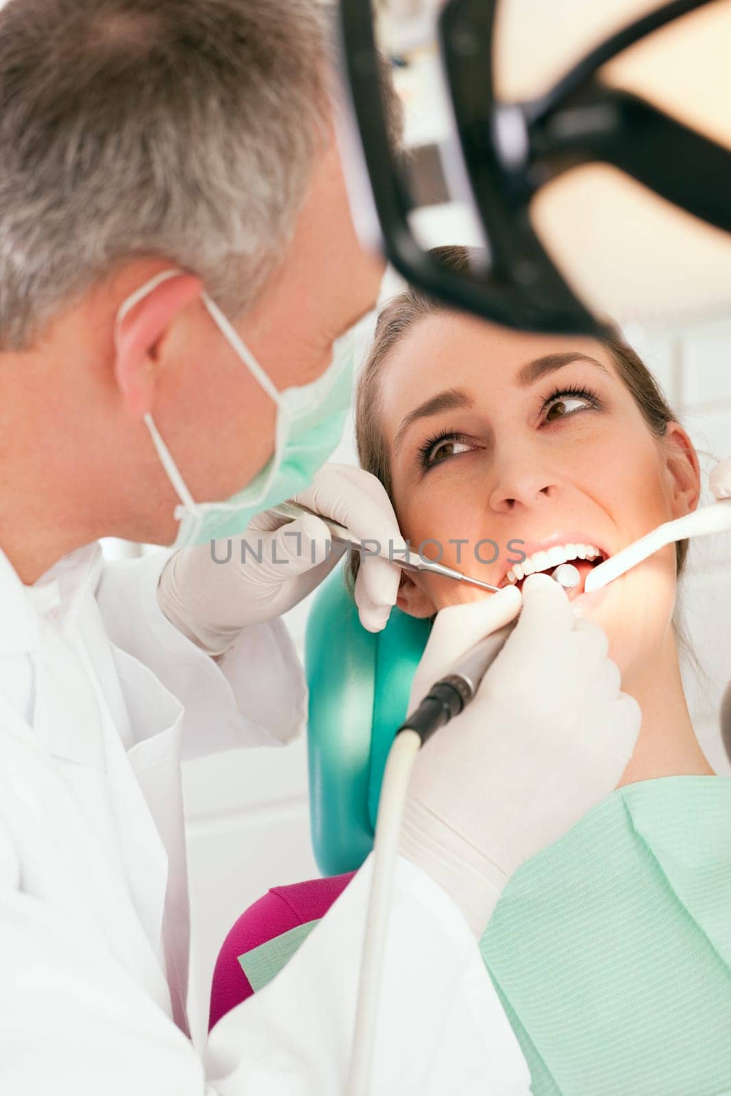 Patient at the dentist - treatment with Bo