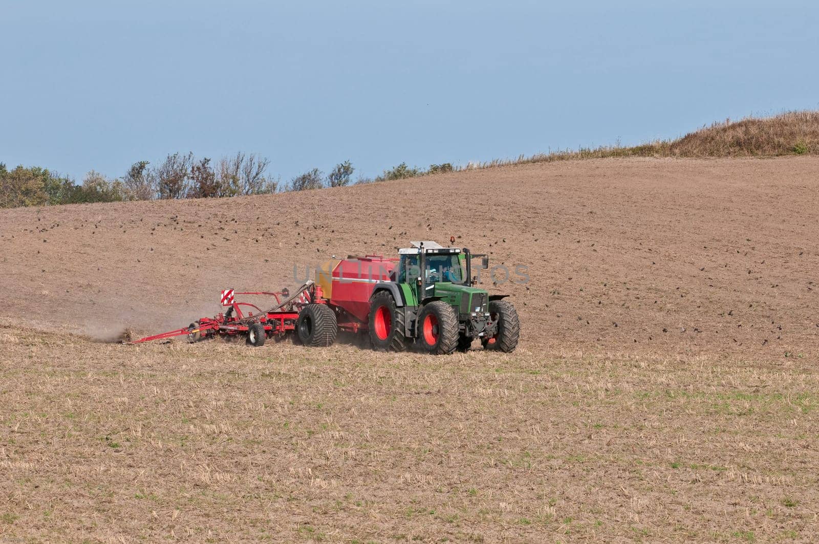 Tractor ploughing