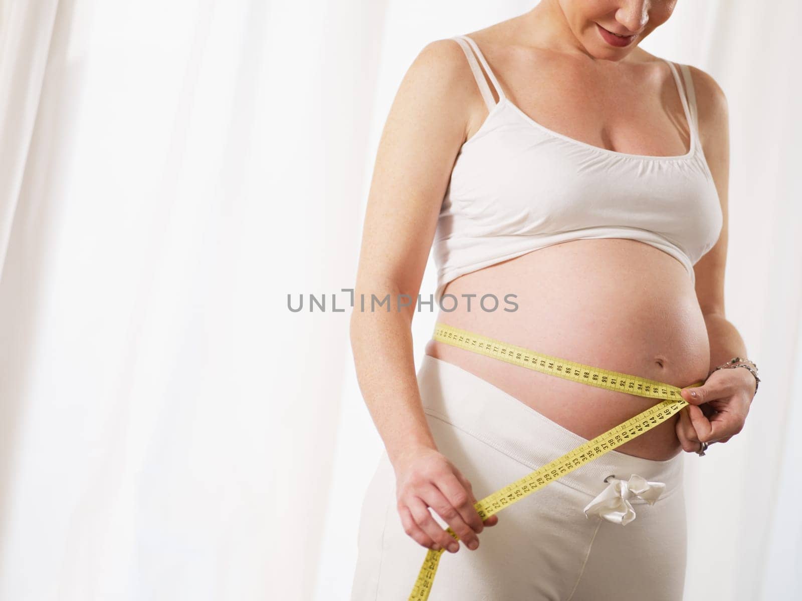 pregnant woman drinking water