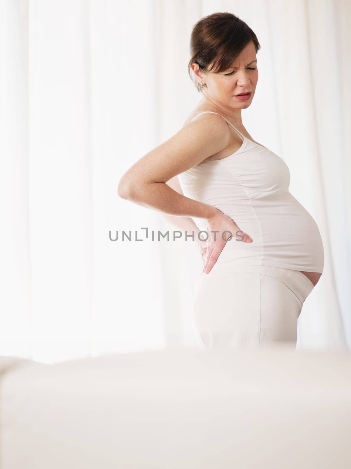 pregnant woman drinking water