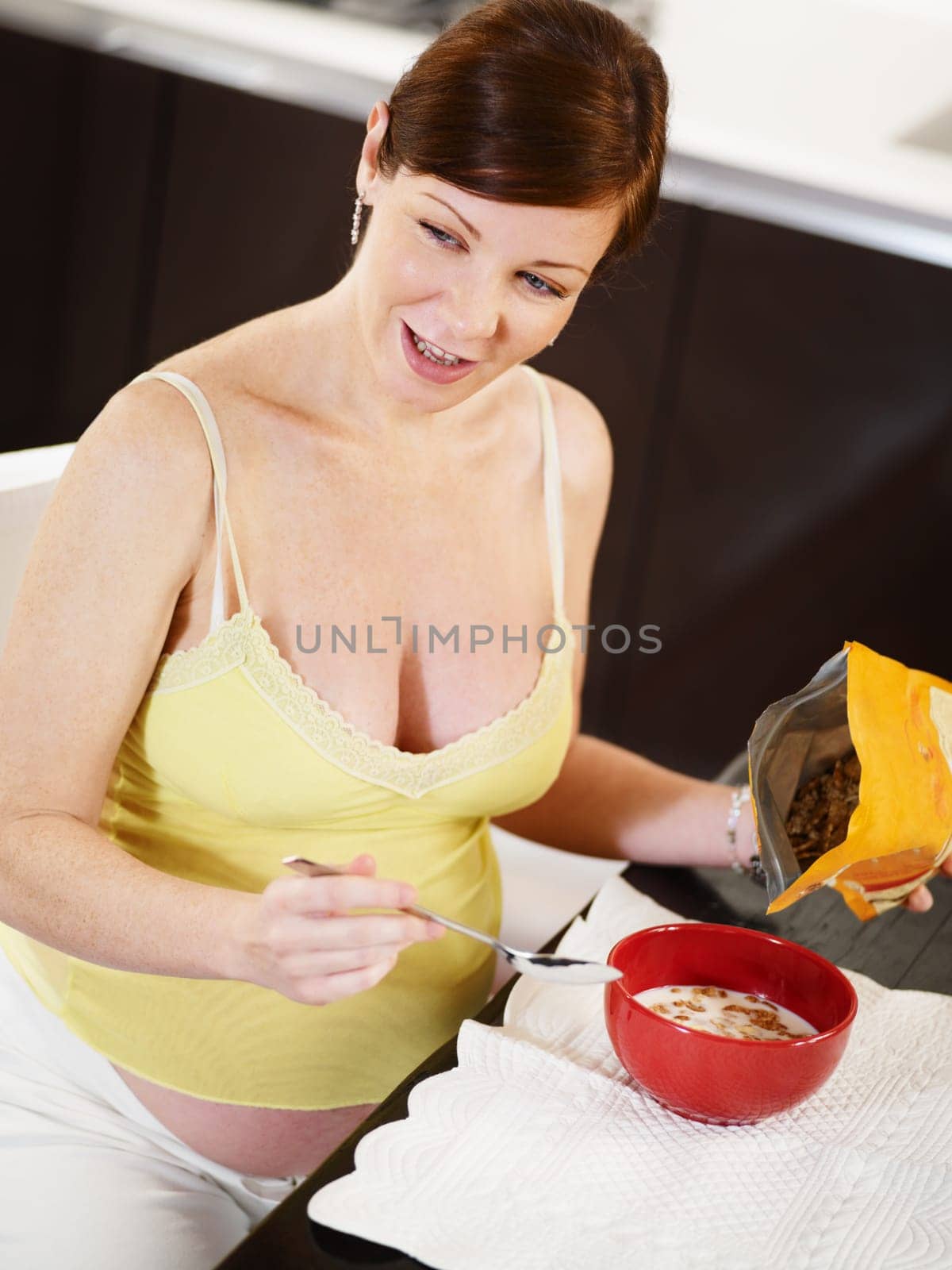 pregnant woman drinking water
