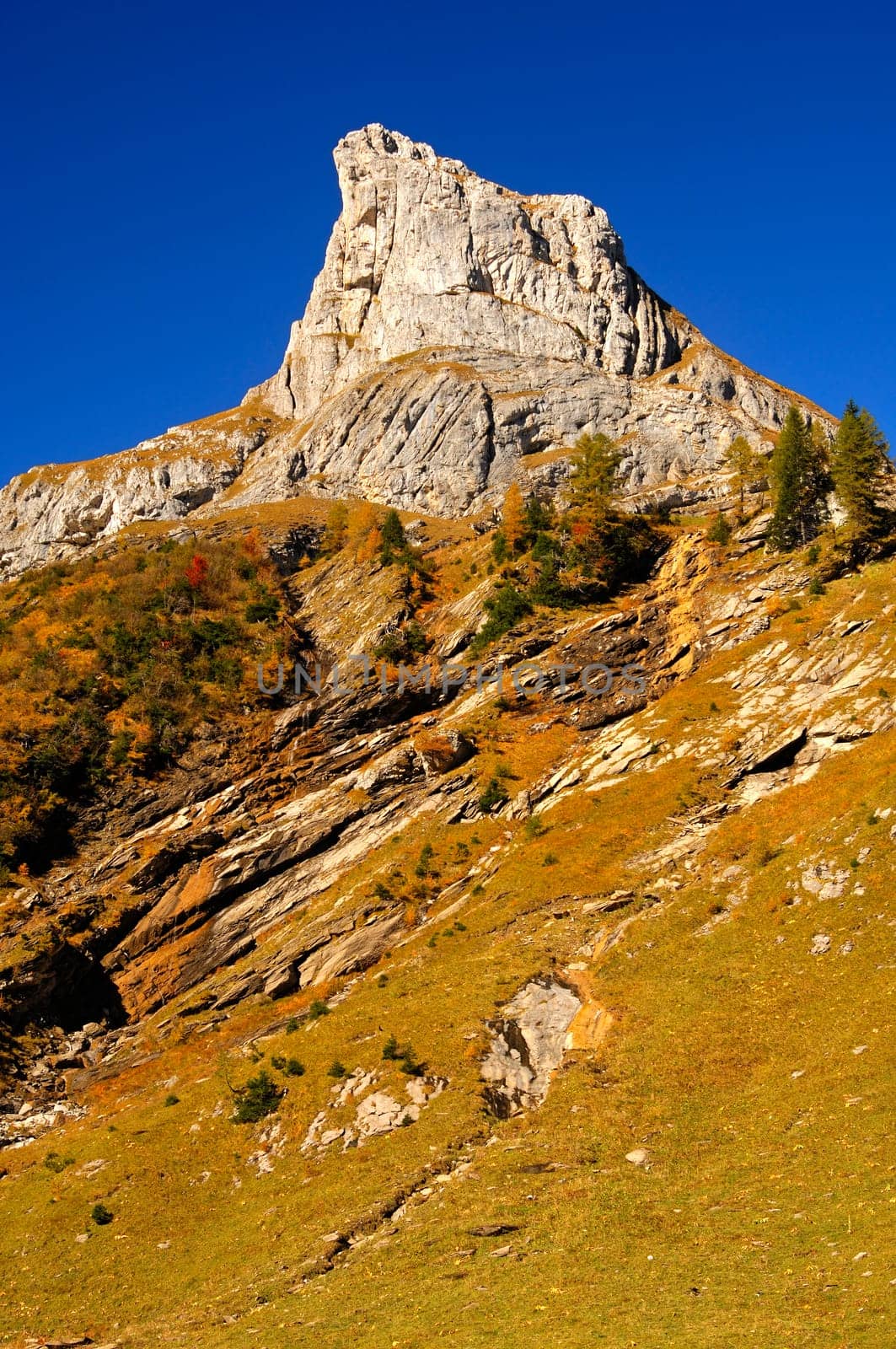 Isolated rocky peak,Alps,Switzerland