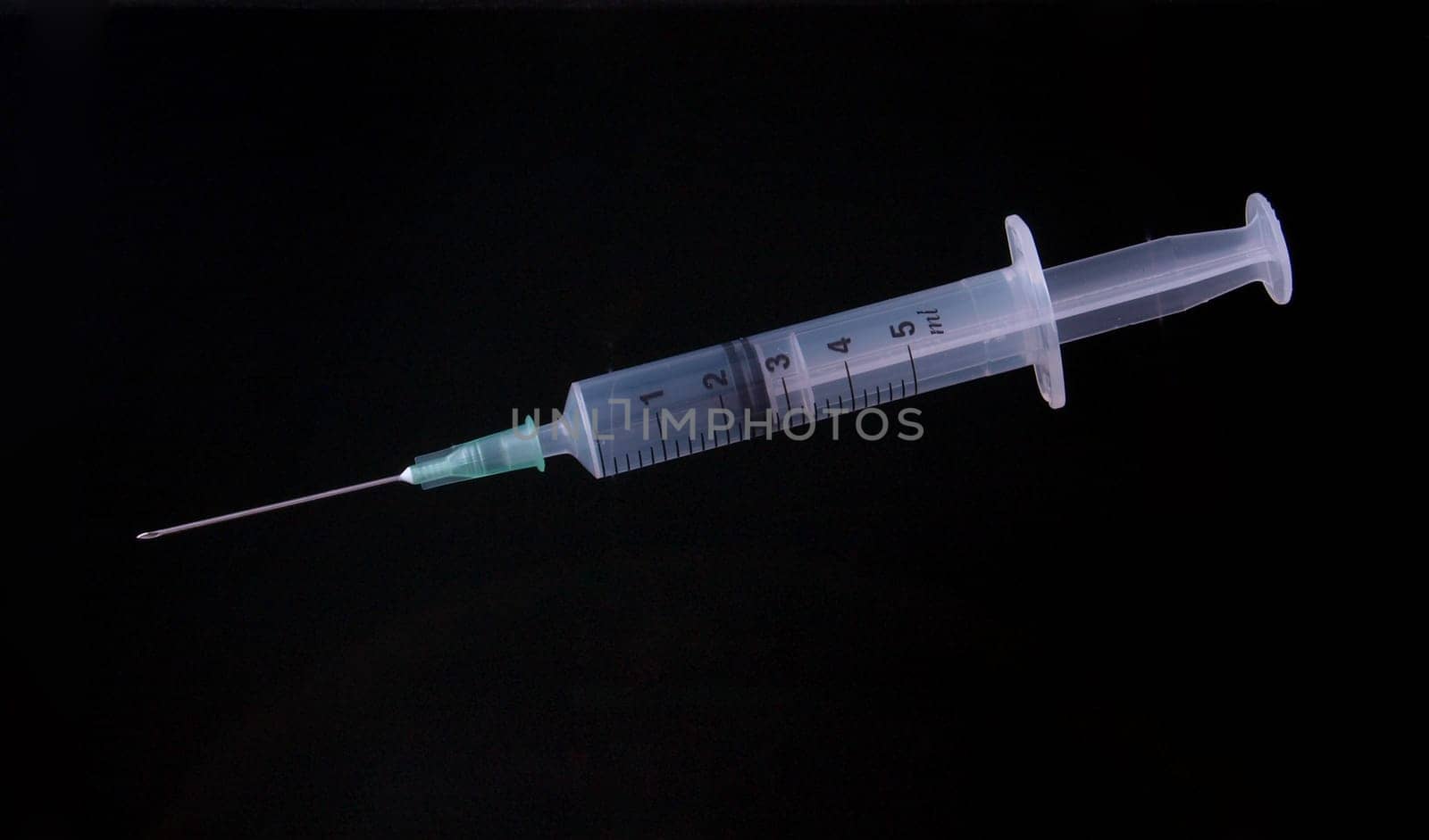 Hypodermic syringe and needle used for immunization.
