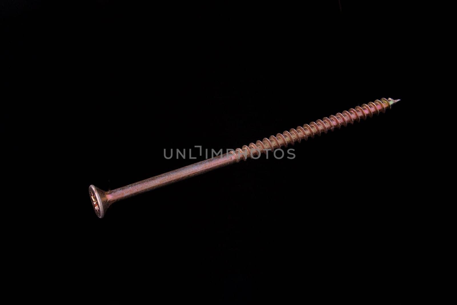 Steal wood screw on a black background.