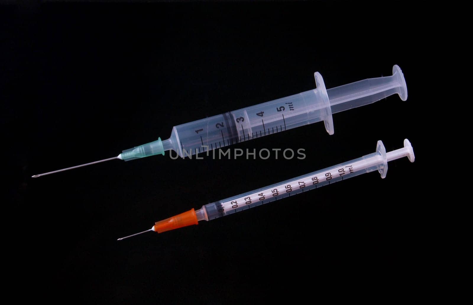 Hypodermic syringe and needle used for immunization.