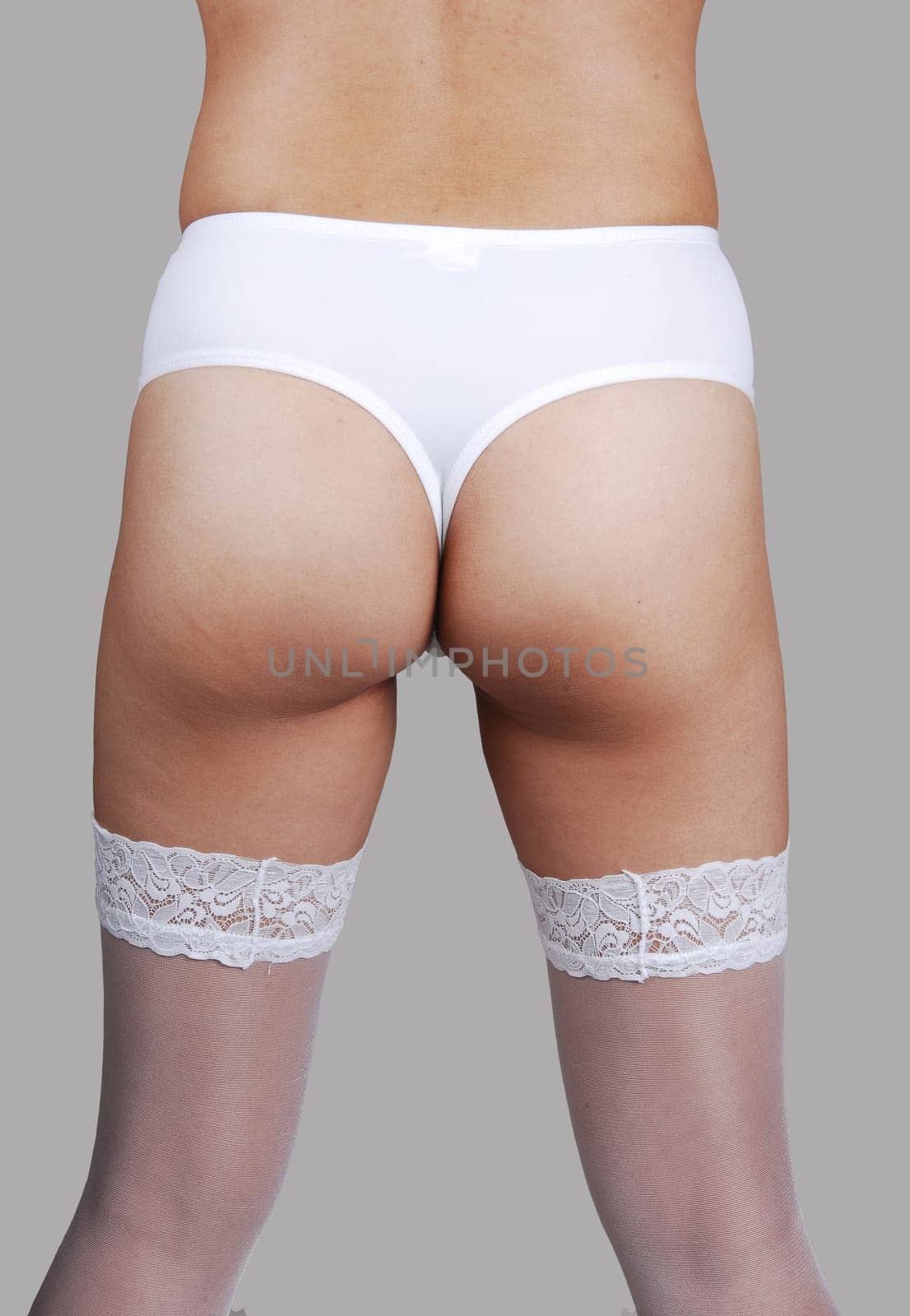 Back of girl in lingerie.
