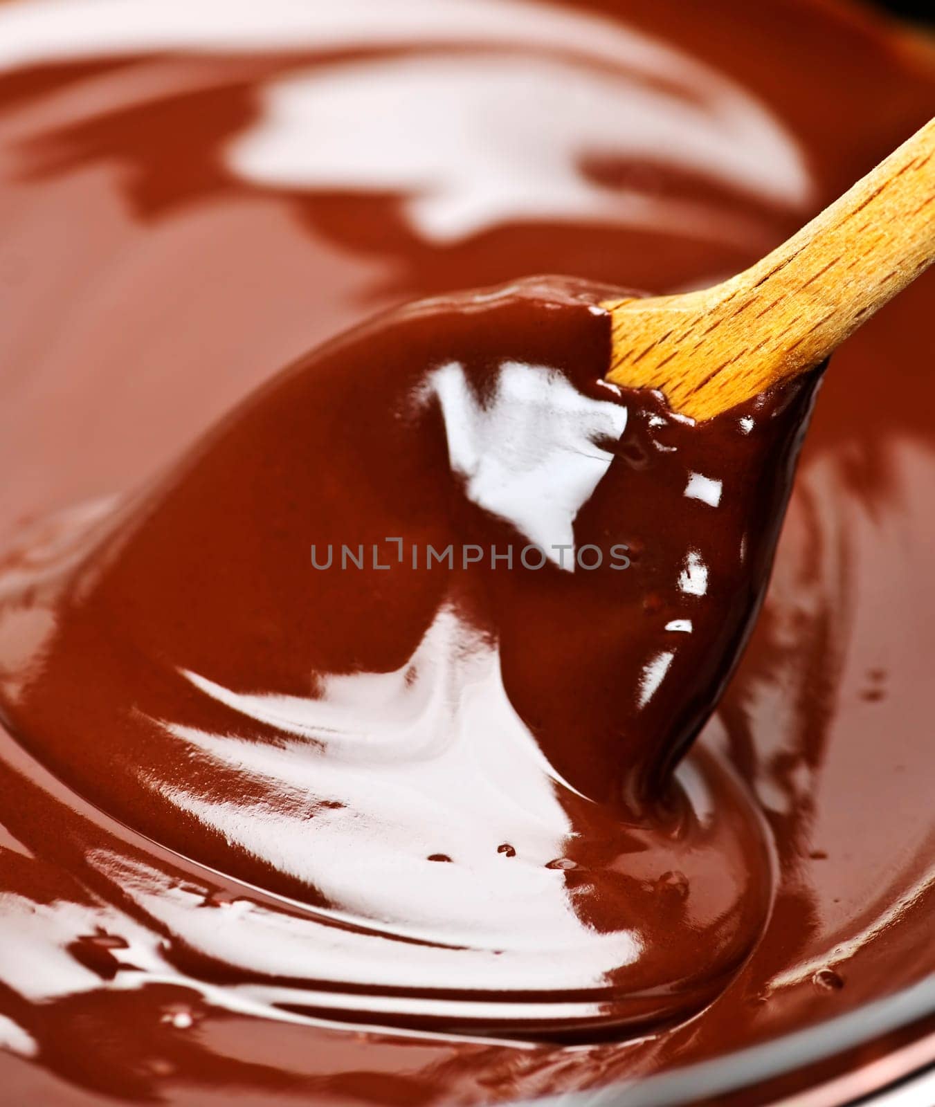 Melted chocolate and spoon