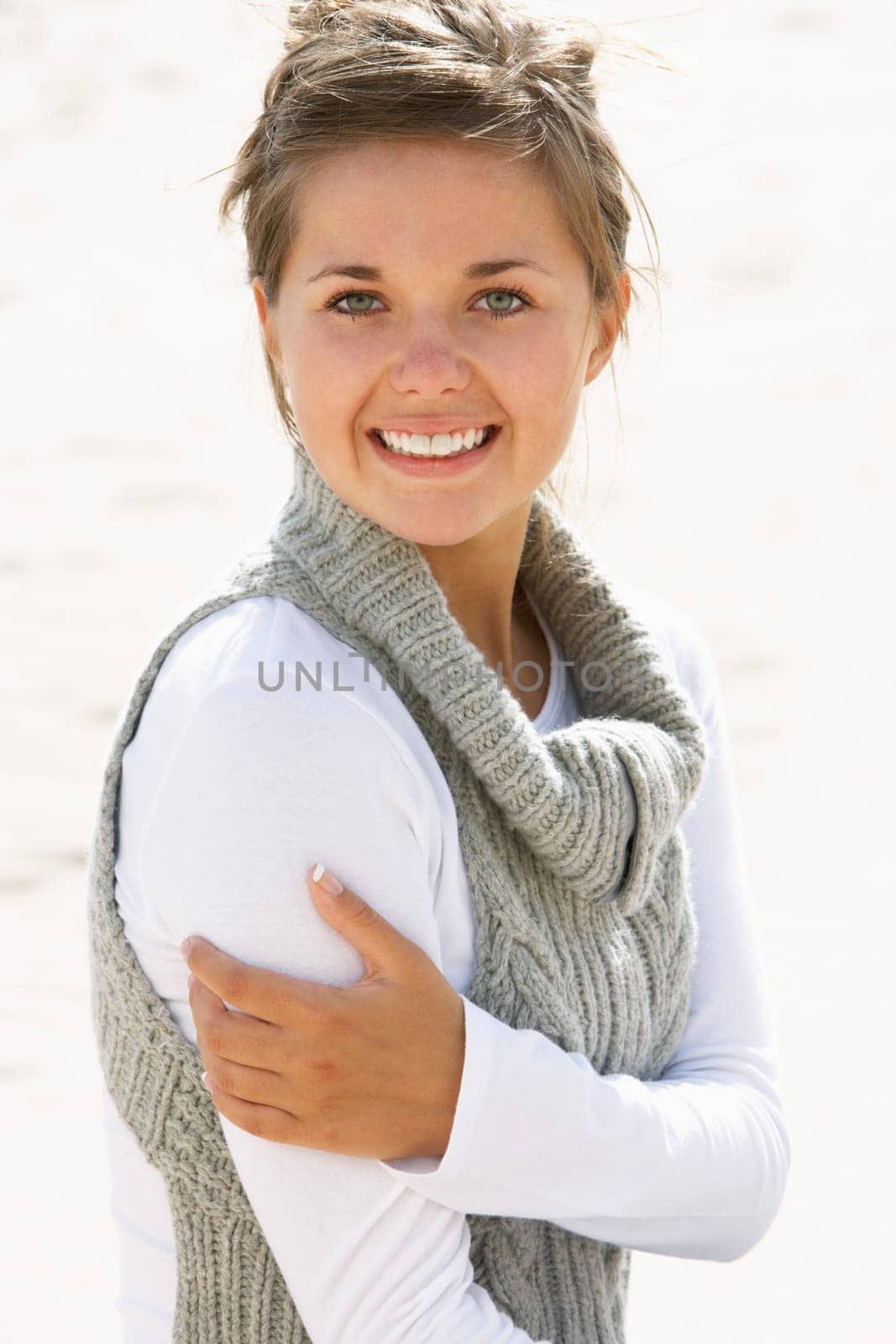 Portrait Of Pretty Teenage Girl On Beach