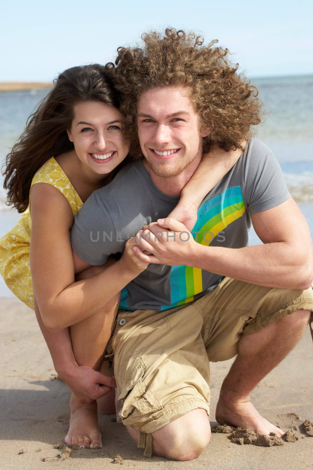 Affectionate Young Couple Having Fun On Beach