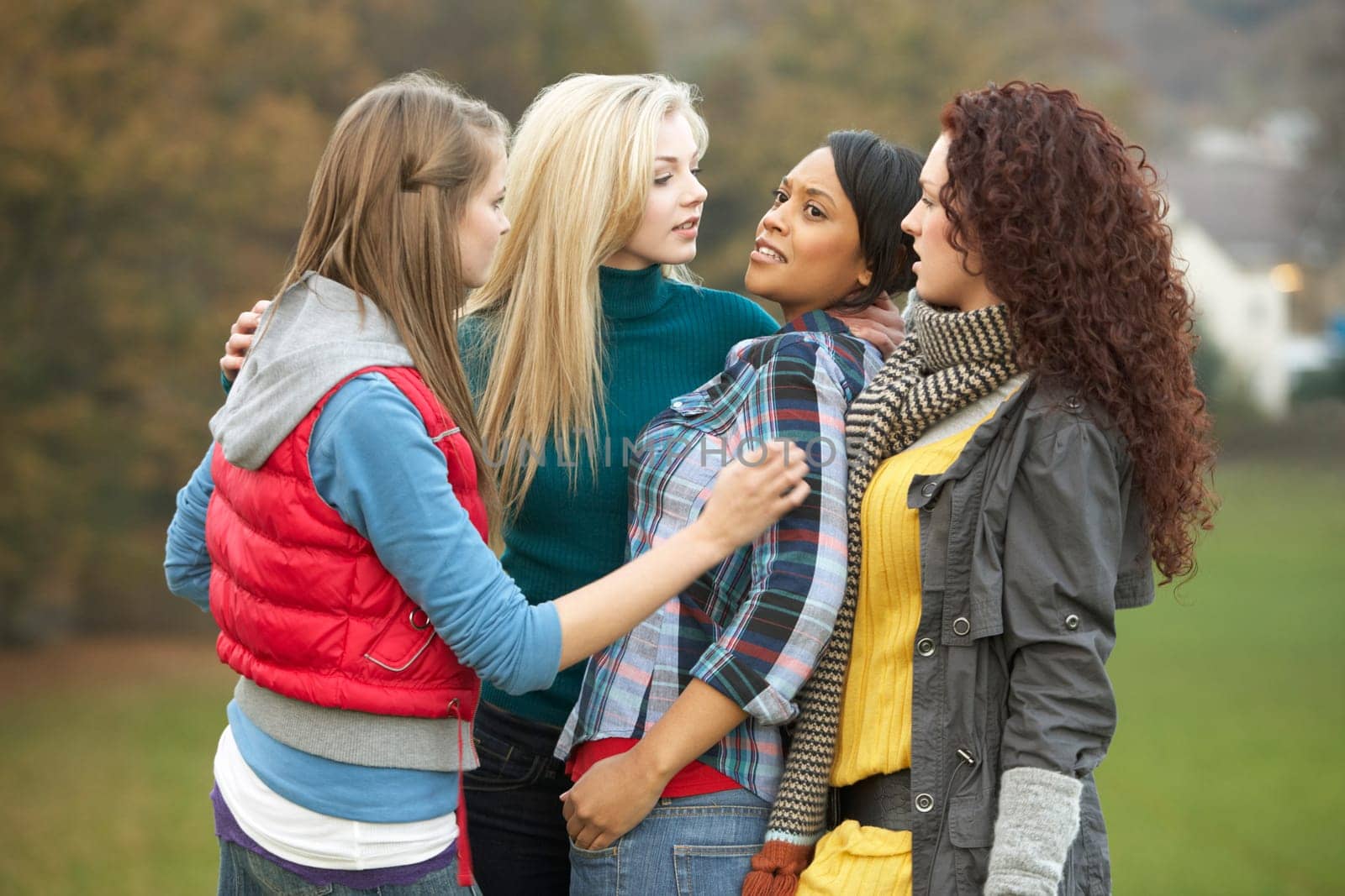 Group Of Female Teenagers Bullying Girl