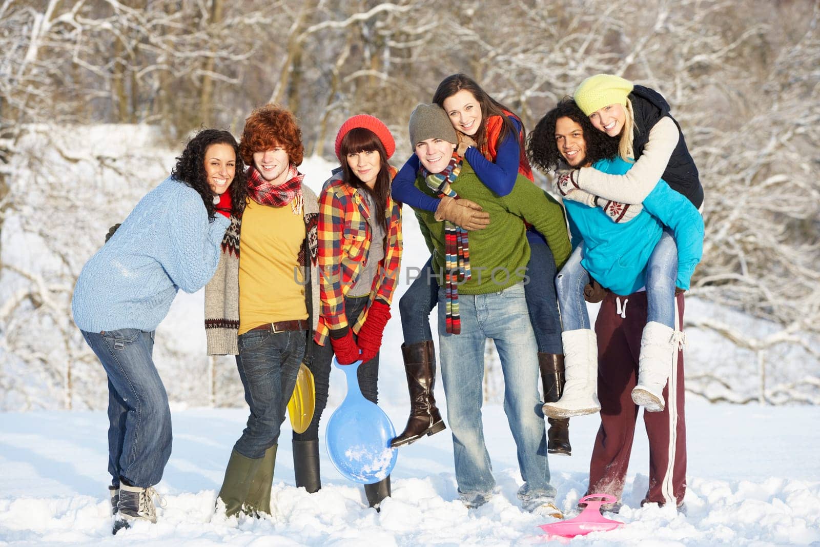 Group Of Teenage Friends Having Fun In Snowy Landscape