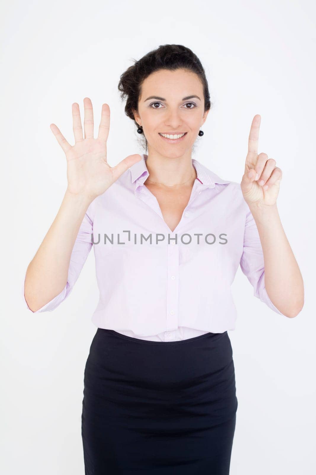 Woman showing the number 6 with six fingers