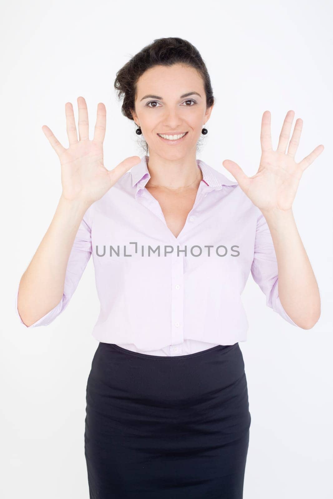 Woman showing the number 10 with ten fingers