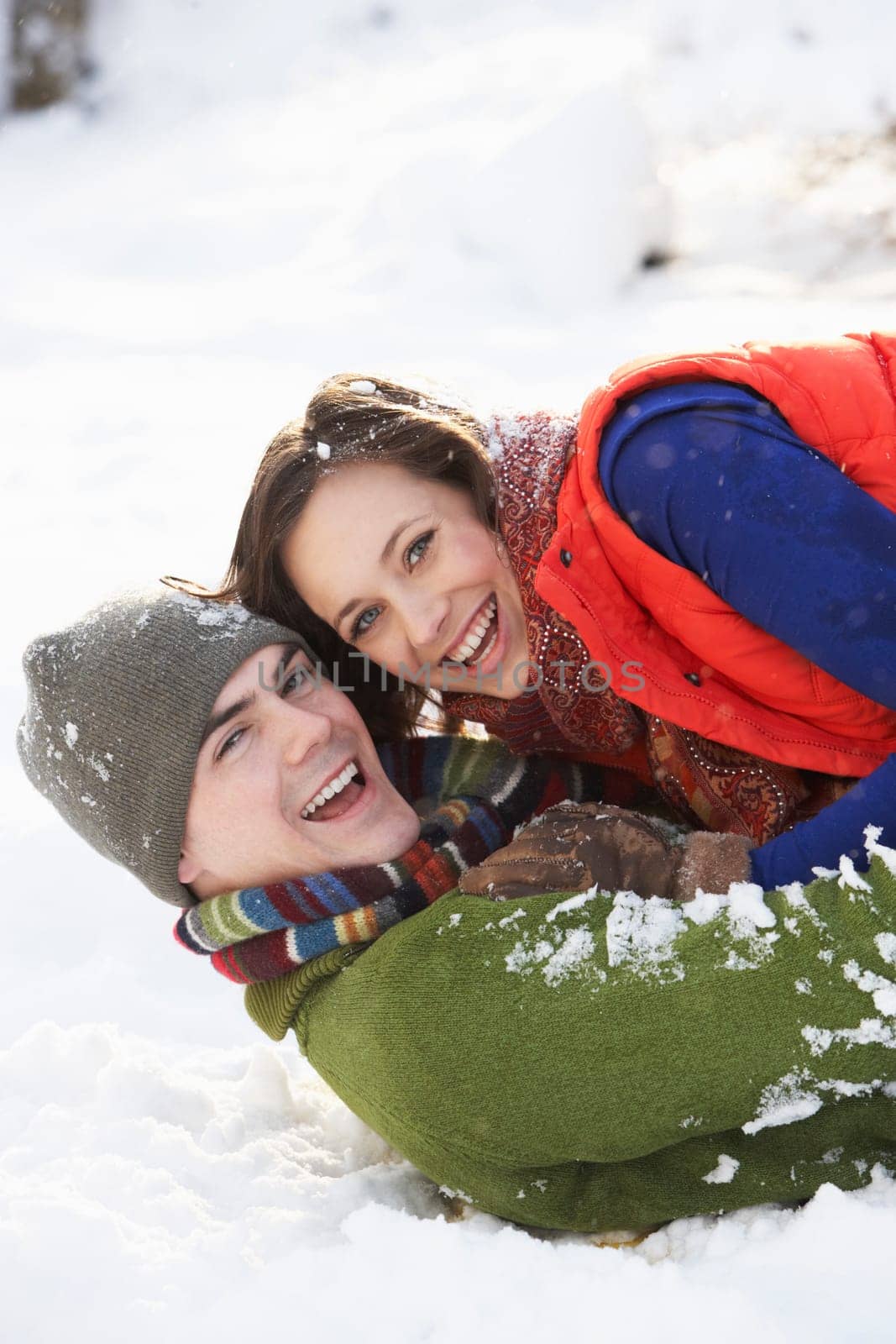 Romantic Teenage Couple Having Fun In Snow