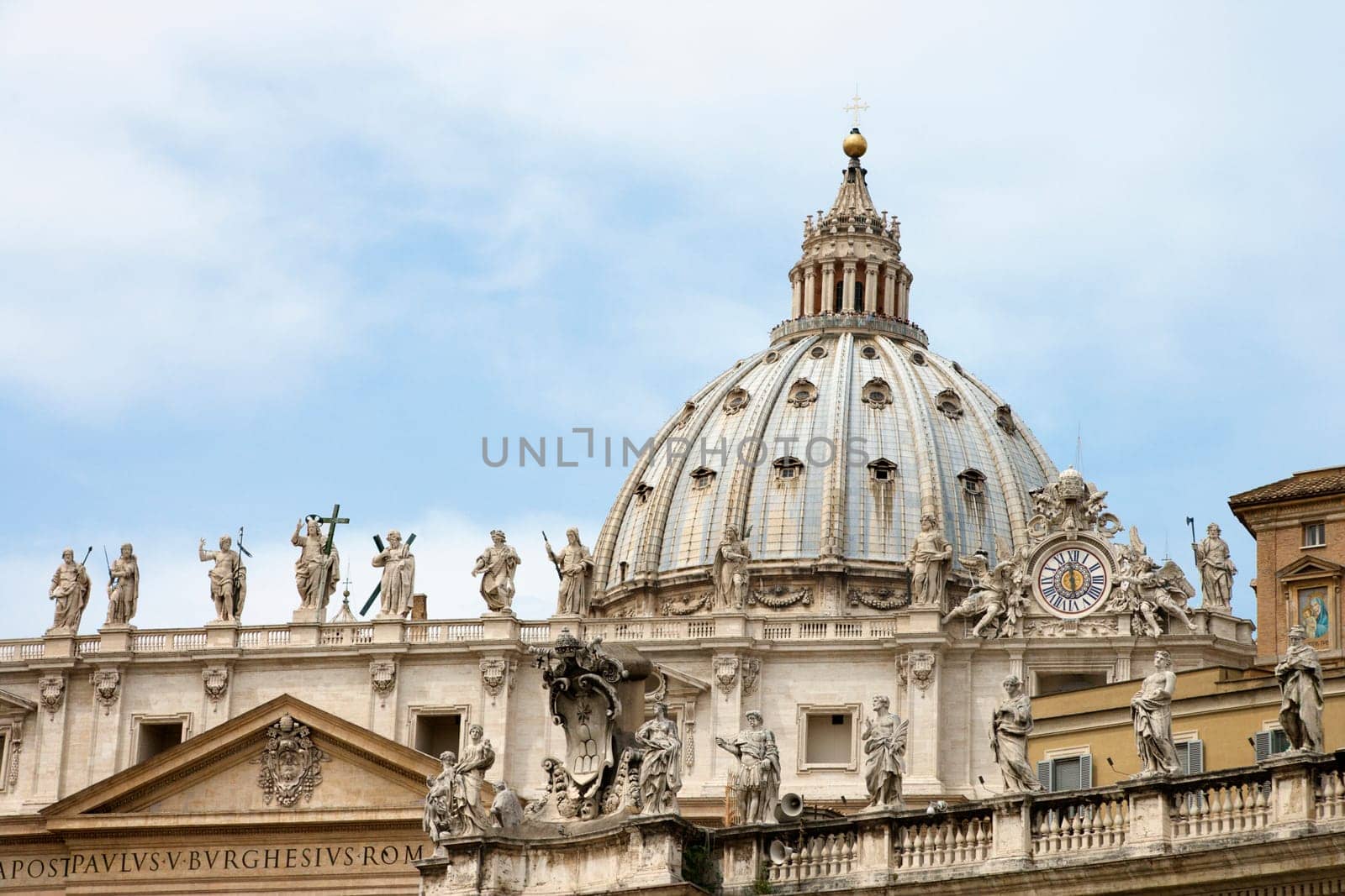 Statuary and dome of St Peter's Basilica. Horizontal shot.