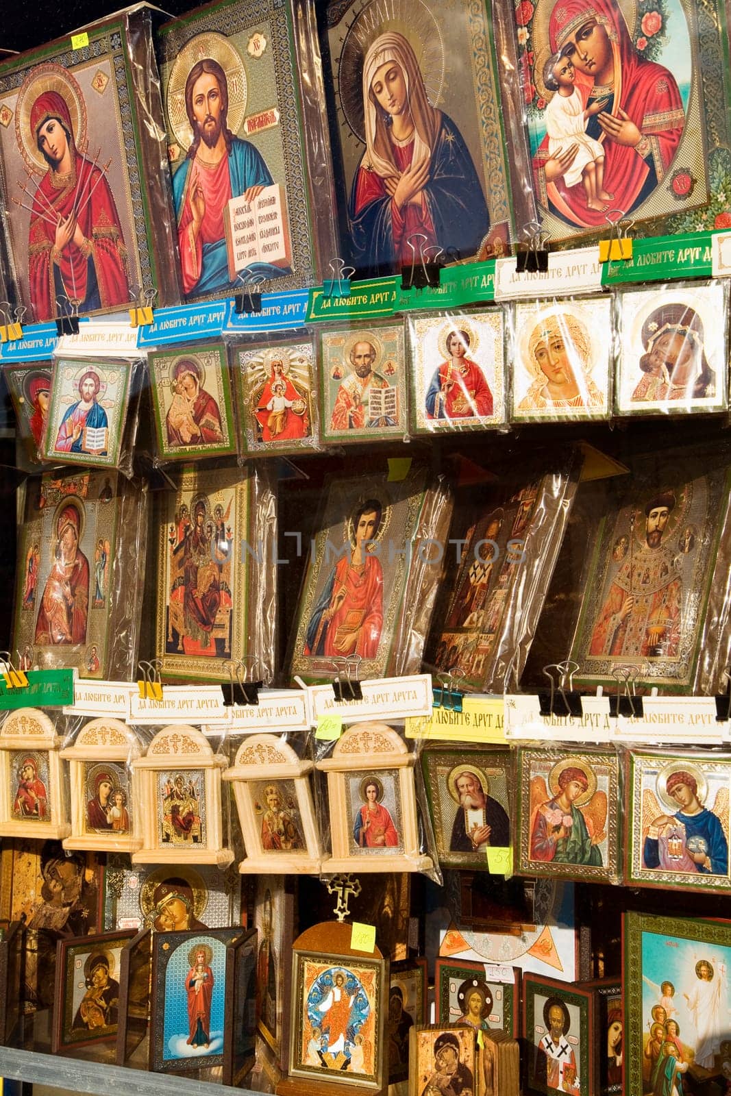 Gifts and cards displaying religious Russian artwork. Vertical shot.