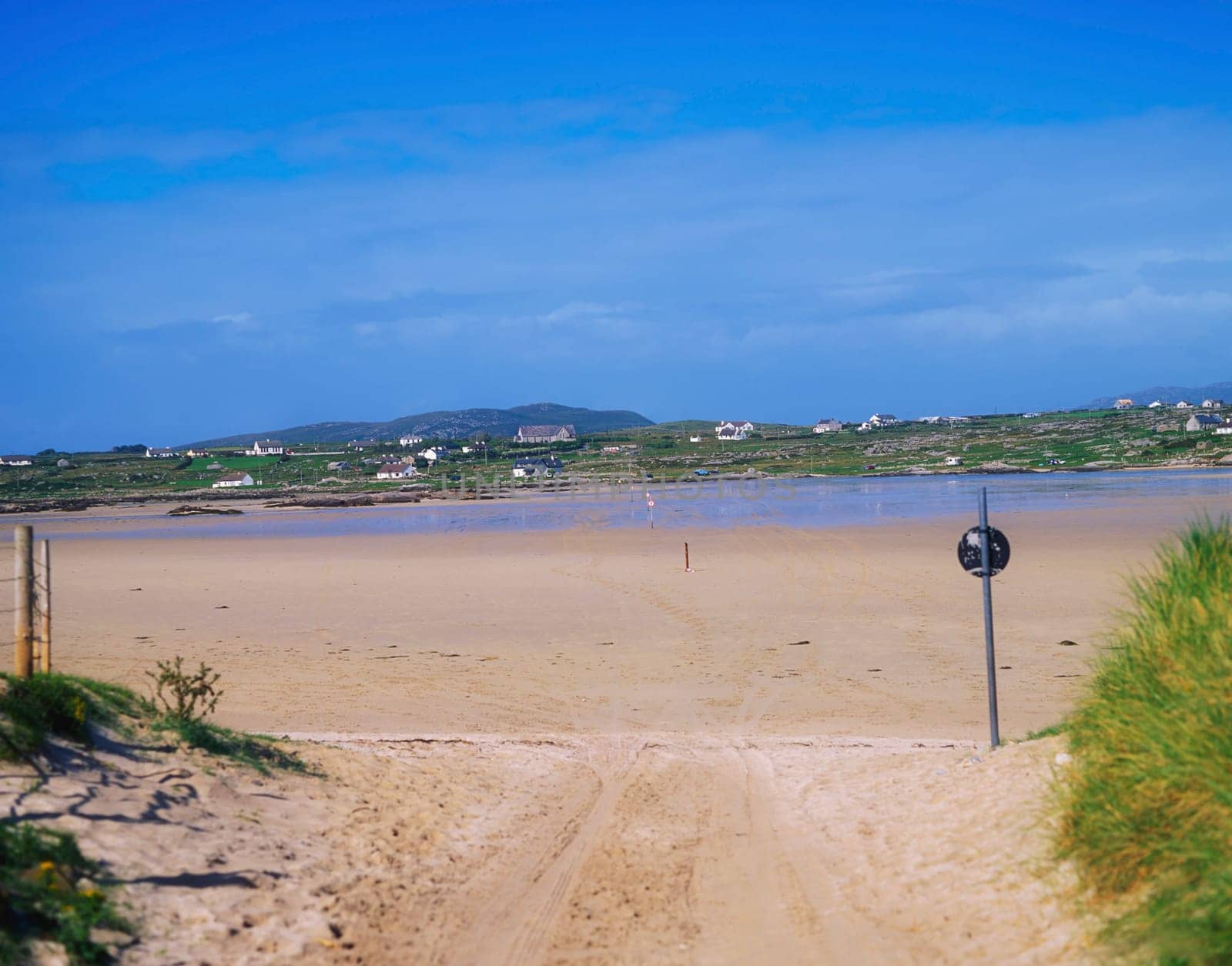 Co Galway, Causeway across the beach to Omey Island, Ireland