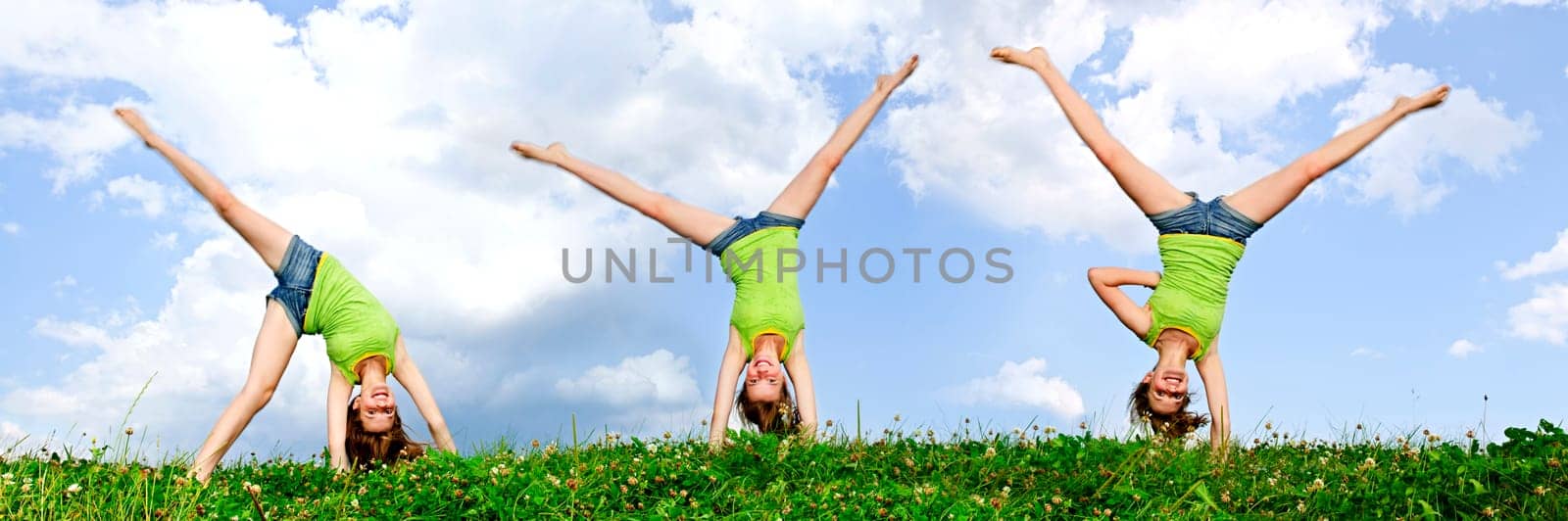 Young girl doing cartwheel