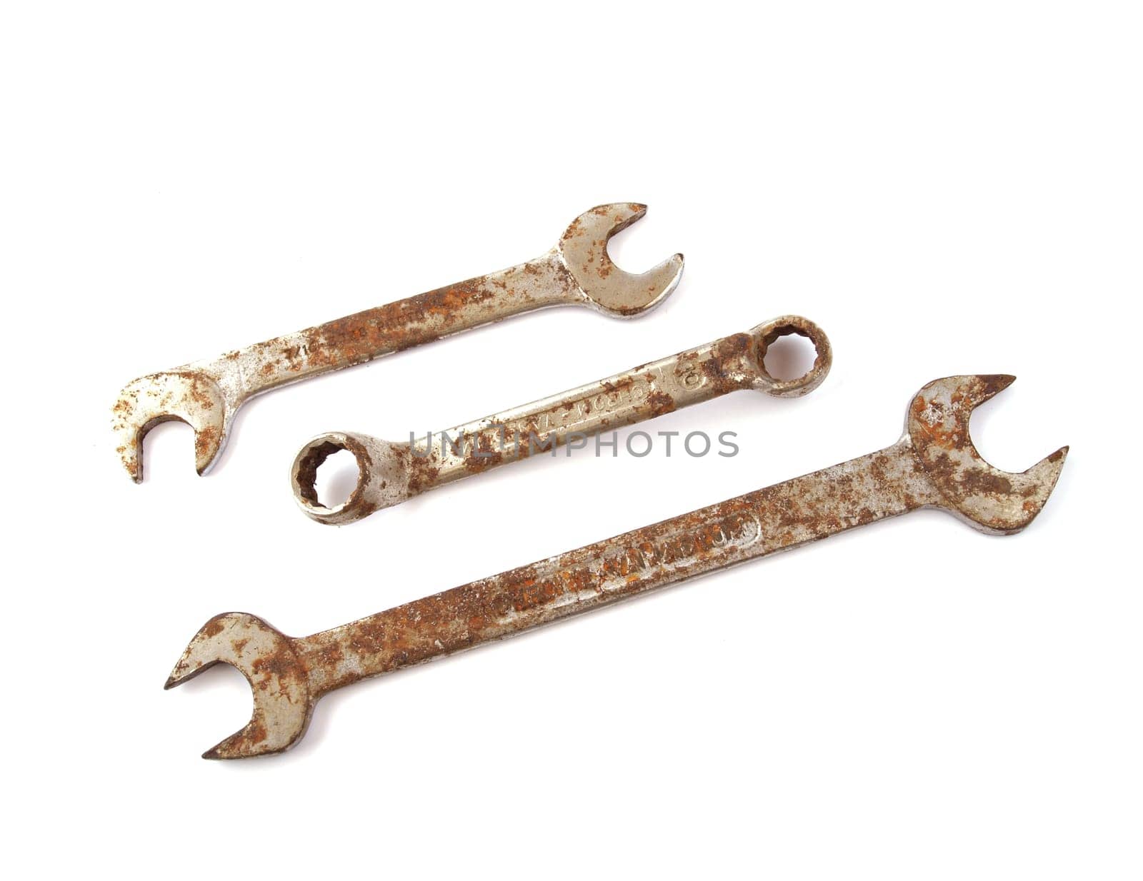 Rusty spanner on a plain white background.