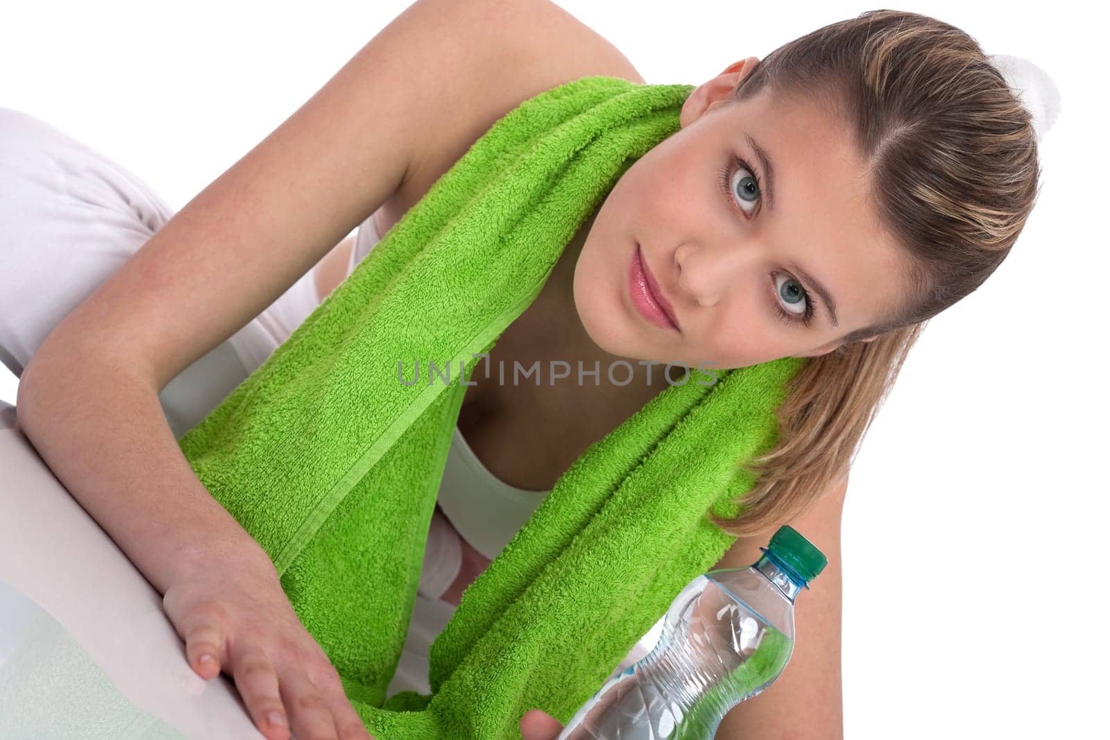 Fitness - Young sportive woman with water and towel