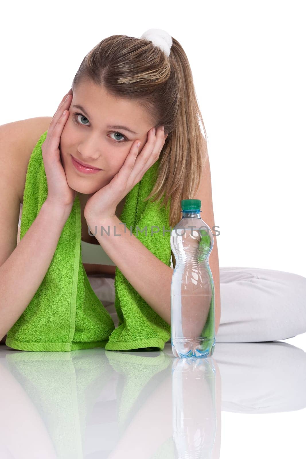 Fitness - Young sportive woman with water and towel