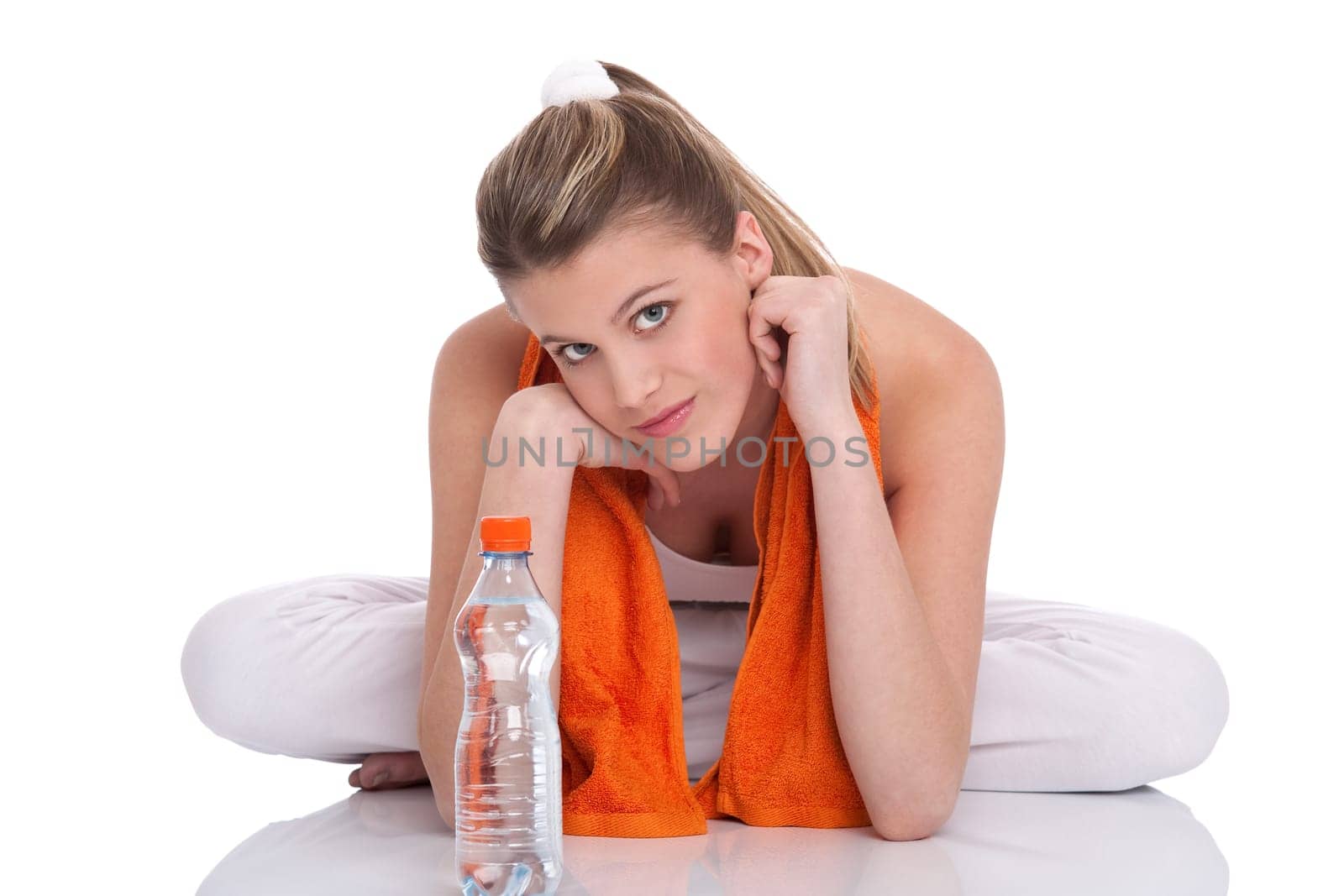 Fitness - Young sportive woman with water and towel